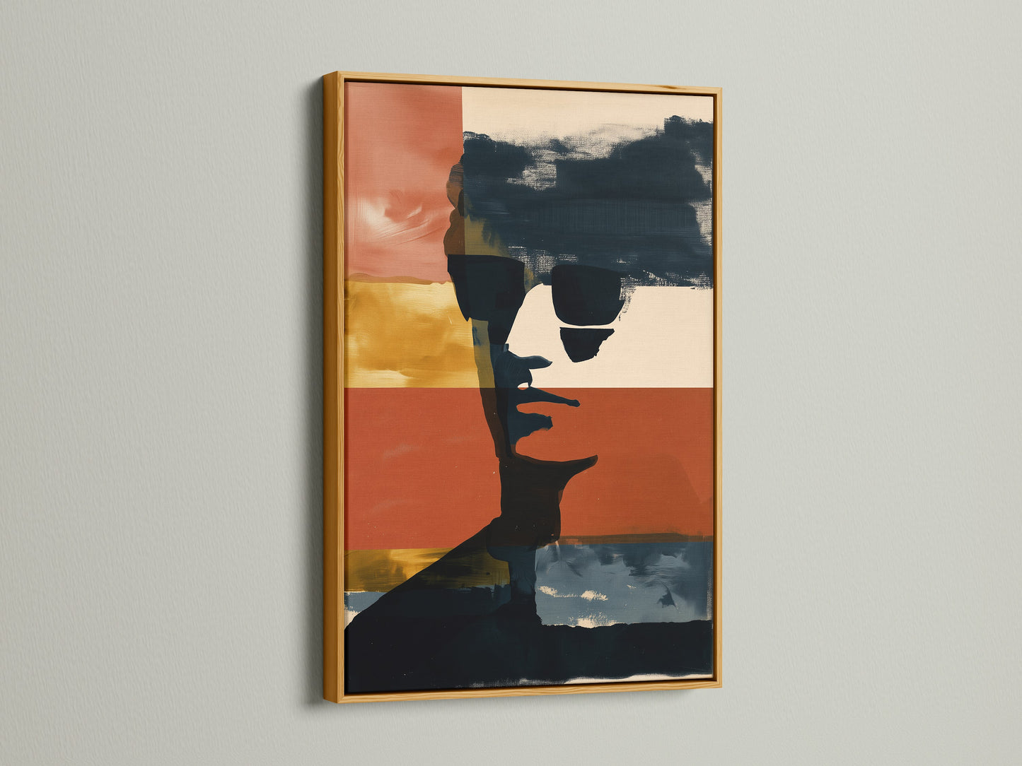 This image shows a gold frame with a modern abstract portrait. The artwork uses bold color blocks. It is a great contemporary wall decor for any home or office. Explore our framed art options today.