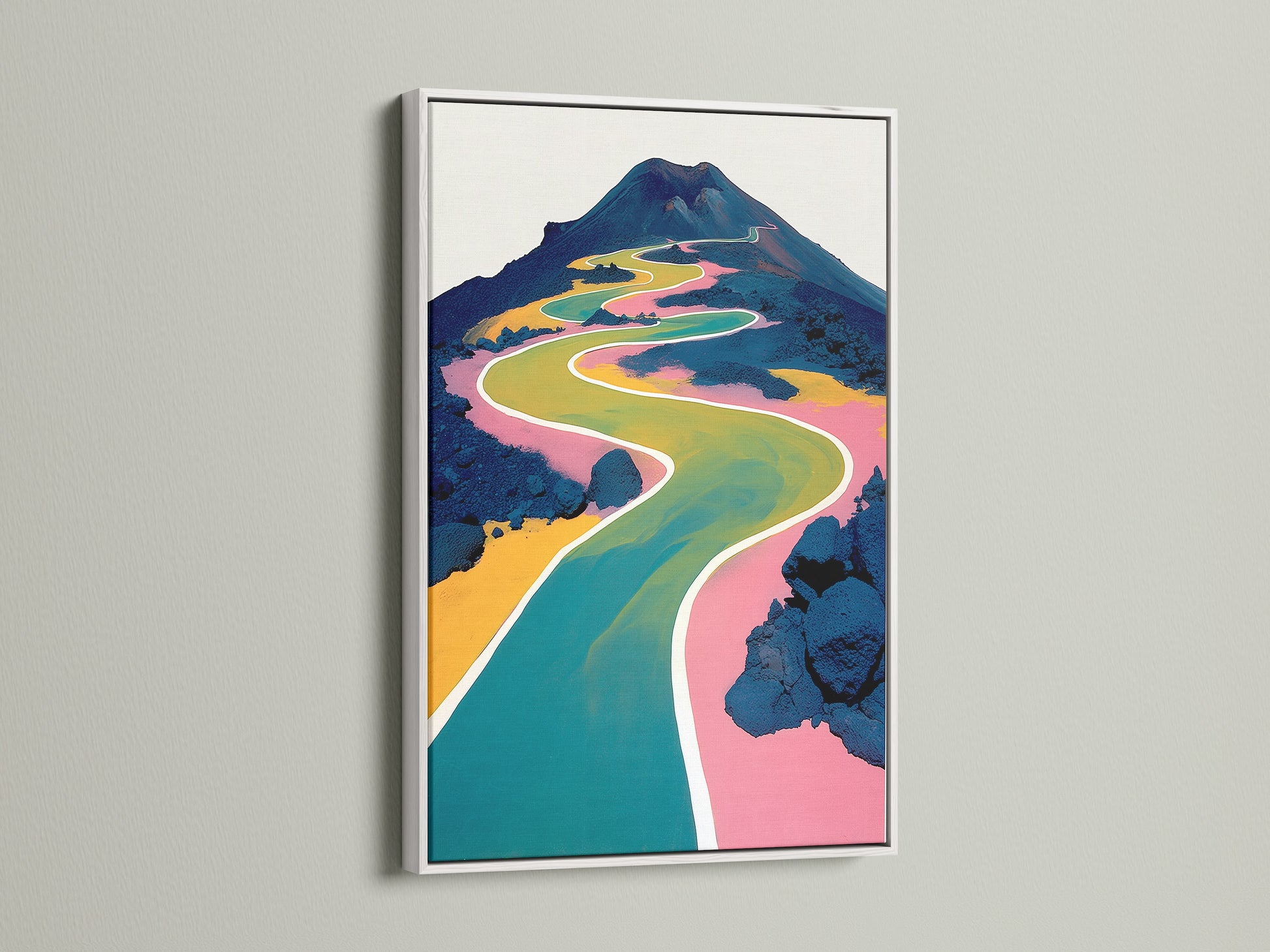 Modern abstract mountain artwork with a white frame. The canvas art features a colorful winding path. This contemporary art is perfect for adding a touch of modern nature to your space.