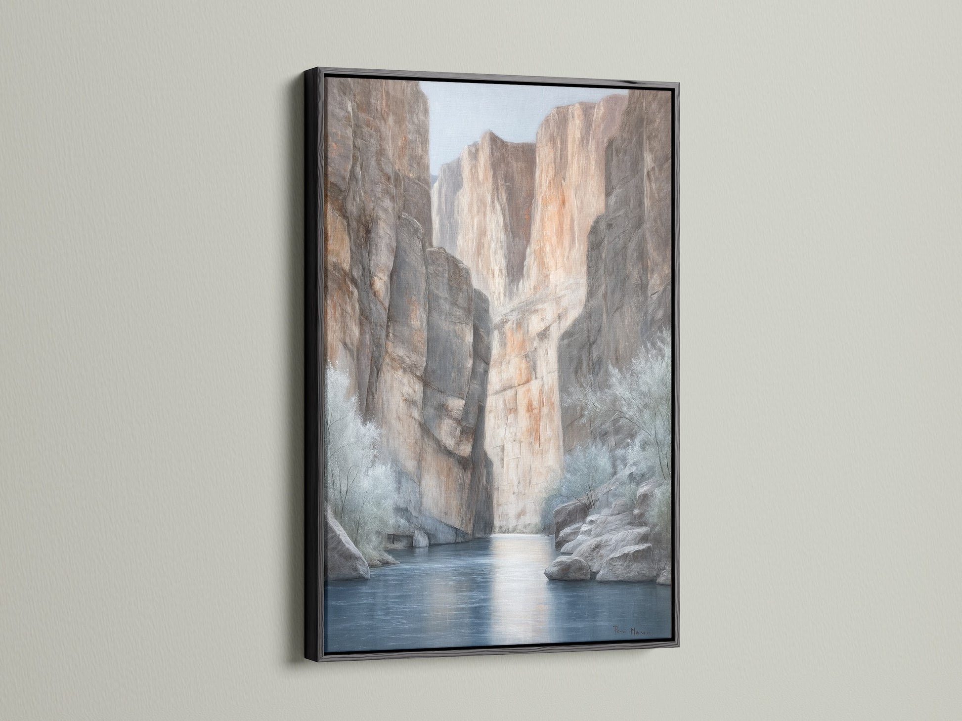 Canyon River canvas print in a bold black frame. This desert landscape artwork adds a modern touch to any room. The black frame makes the neutral tones pop. Ideal for Southwestern-inspired spaces. The river canvas print brings the beauty of nature indoors. Discover earth tone art for your home.