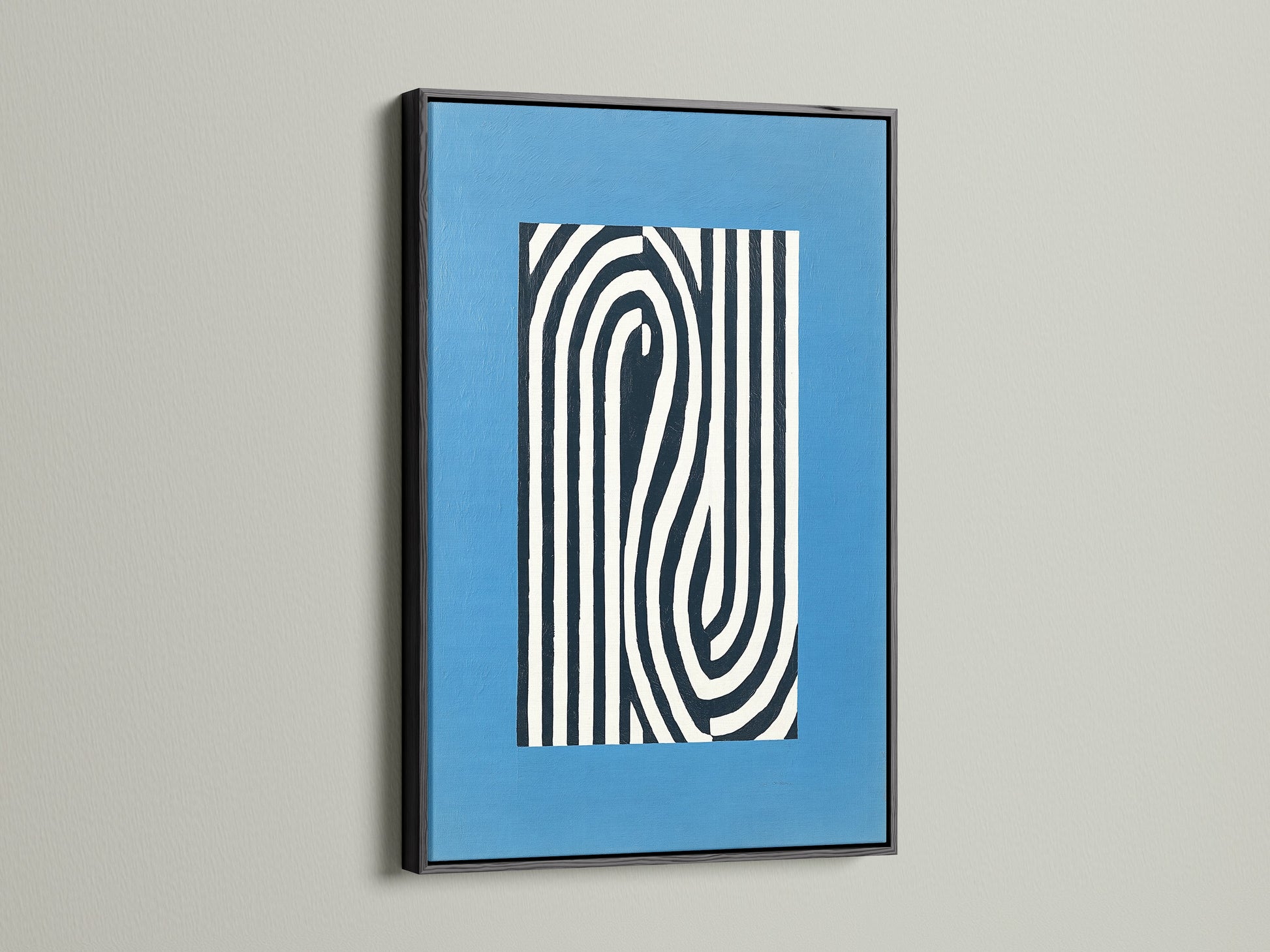 Black frame showcasing an abstract line art print. This modern canvas art adds a bold statement. The optical illusion creates a unique visual effect. Perfect for minimalist decor or a contemporary office. Shop our black framed art now.