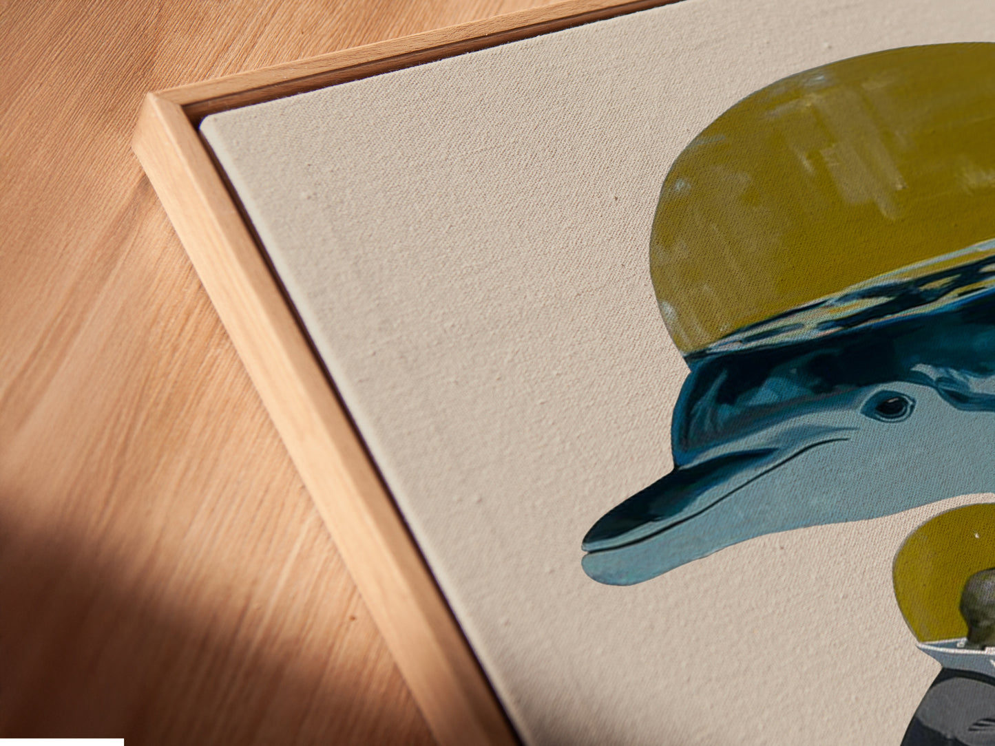 Close-up angled view of a canvas print in a floating frame. The artwork features a diver and a whale. The contemporary marine life art is highlighted. The floating frame enhances the art's depth. It is perfect for any wall.