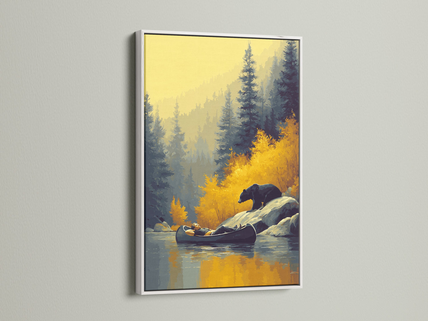 The artwork displays a peaceful forest scene with a bear and canoe. It is presented in a white frame. The light frame complements the nature wall art. It is perfect for creating a calming atmosphere.