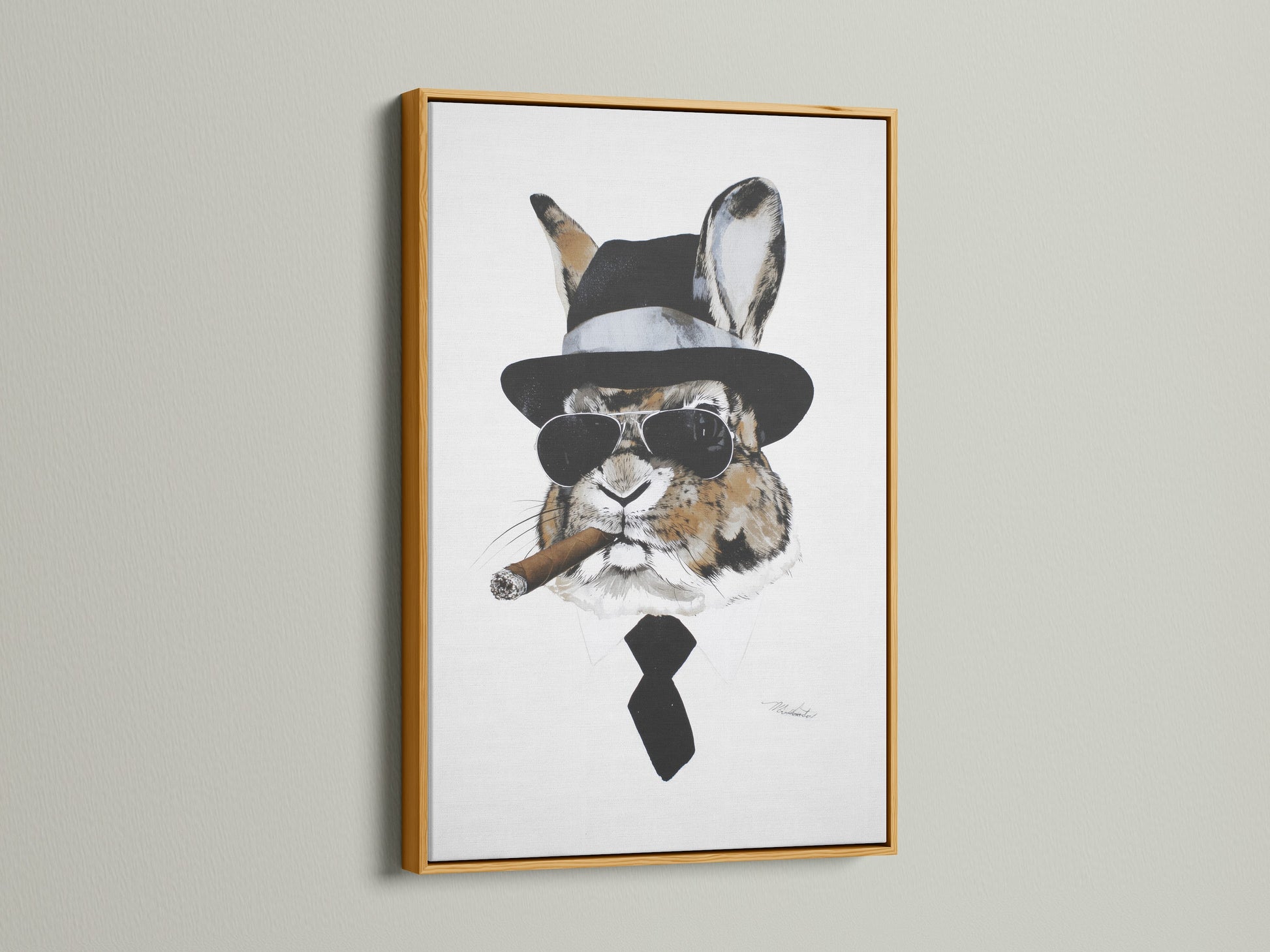Gentleman Rabbit artwork in a gold frame. This funny animal print adds a touch of luxury. The gold frame enhances the artwork's appeal. Ideal for adding a quirky vintage touch. Great for living rooms or man caves. It is a conversation starter.