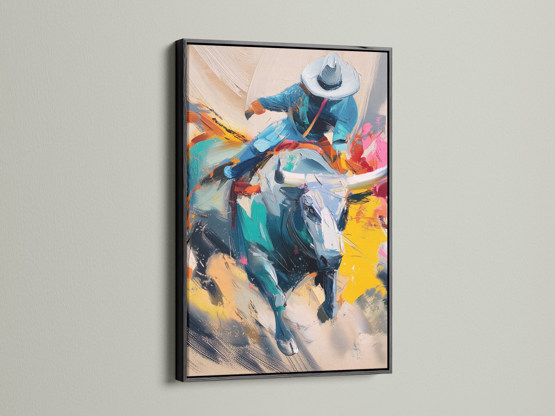 Add a touch of sophistication with cowboy rodeo canvas art in a black frame. This western art print features a bull rider. Complements western home decor. Perfect for a man cave or office.