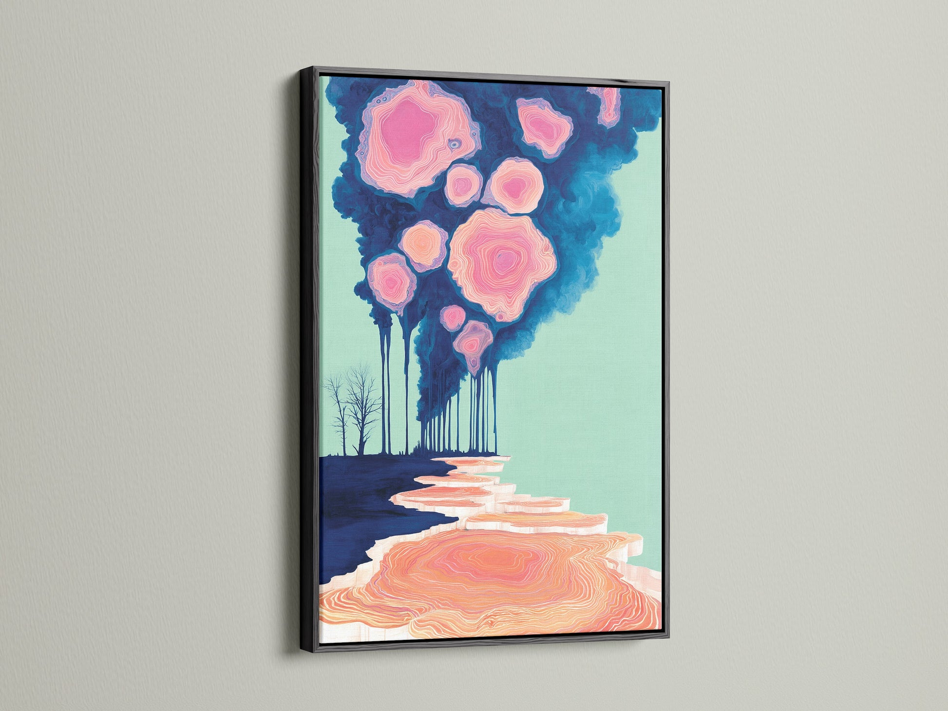 Browse our surreal landscape canvas print with a pink cloud forest in a black frame. This abstract nature artwork makes a bold statement in any room. The black frame adds sophistication to the dreamy artwork. Suitable for entryway art and creating stylish homes apartments and studios. Explore our coral pink decor options today.