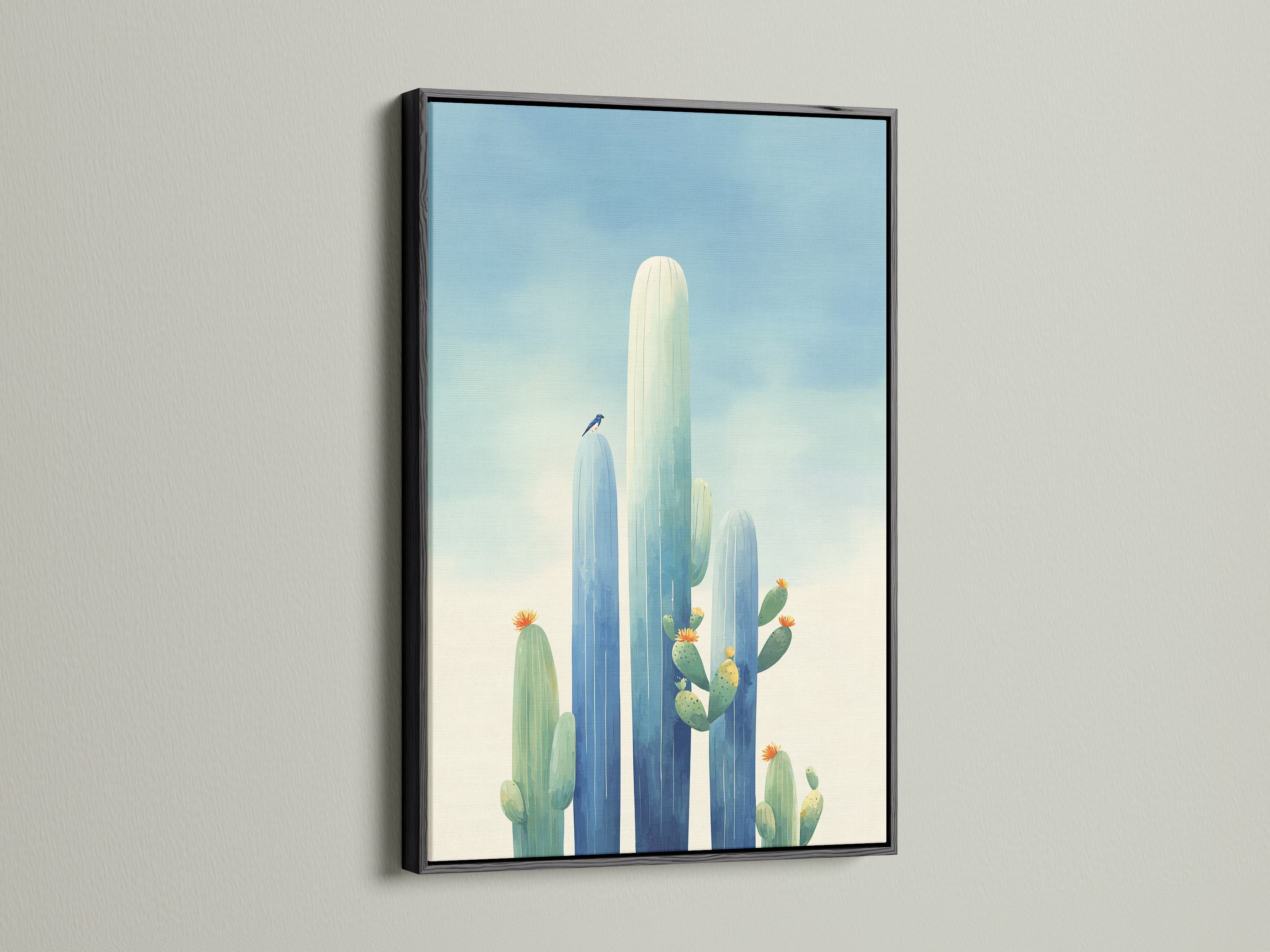 Cactus canvas print in a black frame. The desert wall art is perfect for modern interiors. Southwestern decor meets contemporary style. The arid landscape adds a unique touch. A striking plant art print for housewarming gifts.