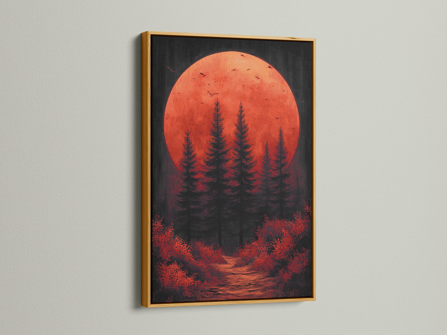 A stunning gold frame showcases the forest moon canvas print. The red orange decor and moody landscape provide a mystical touch. This sunset wall art is ideal for enhancing bedroom accents or studio decor. The gold frame adds elegance.