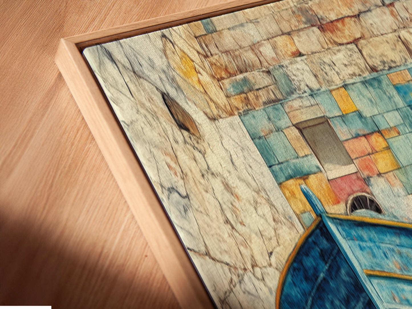 Angled close up showcases a canvas print in a floating frame. The Coastal Boat artwork features a turquoise blue boat. Mediterranean style enhances your entryway. Nautical decor for living rooms or vacation homes.