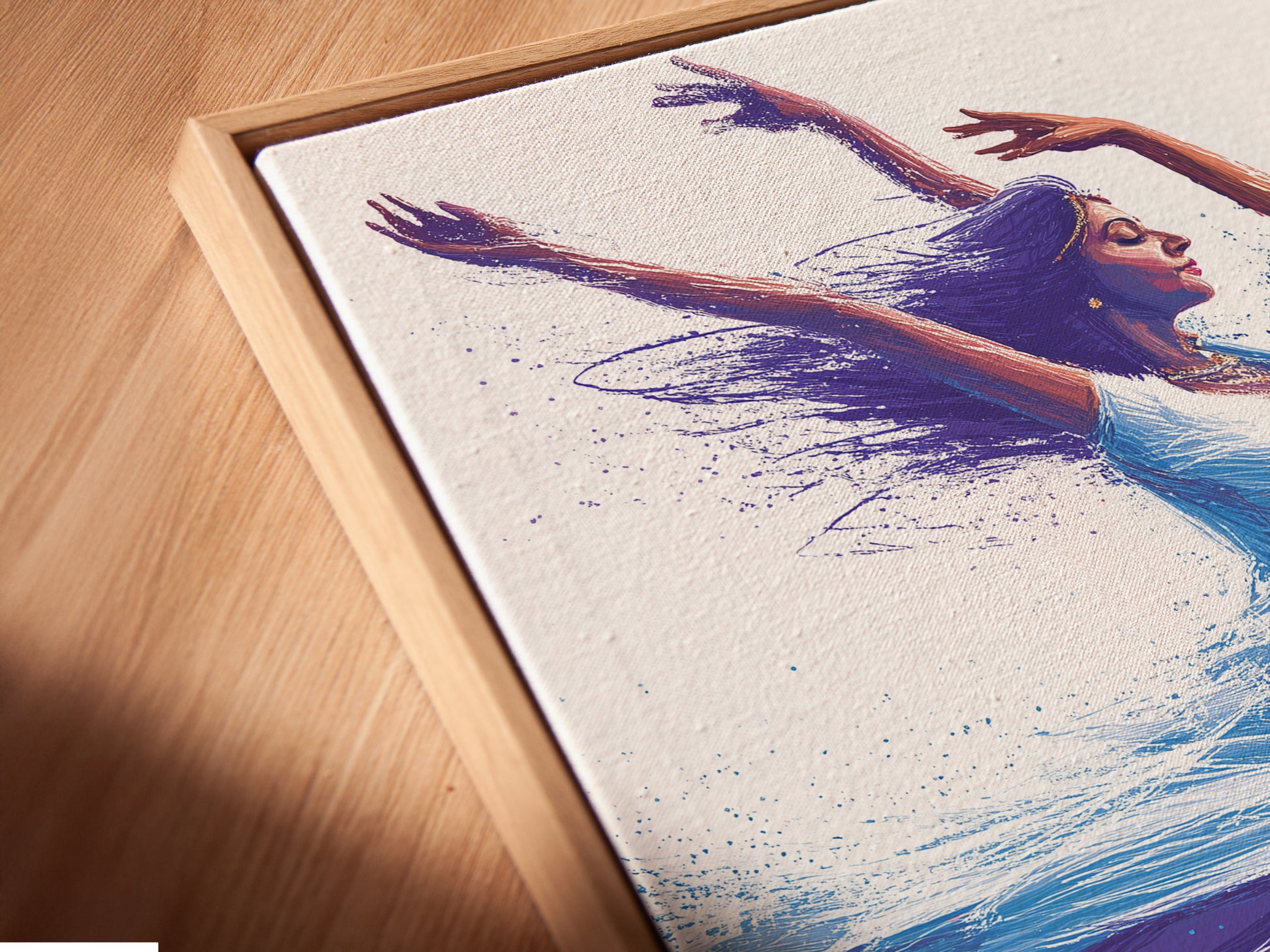 Close-up angled view of a canvas print. The print features Indian Dancers in a floating frame. Teal and orange artwork adds a modern touch. The print is ideal for yoga studios or home decor.
