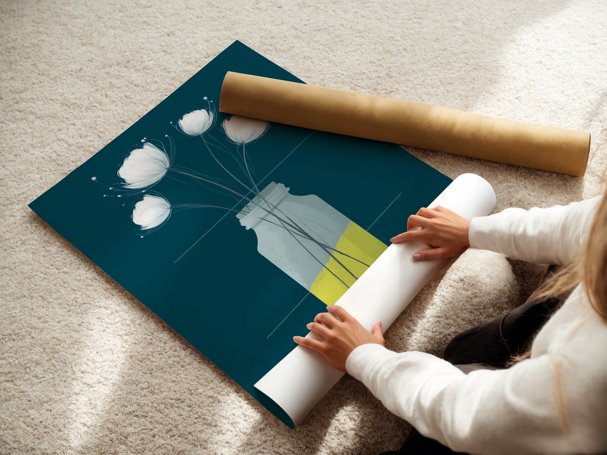 A woman carefully rolls a fine art poster paper. The paper showcases a beautiful floral artwork. Ideal for creating botanical prints or modern art pieces. Perfect for minimalist art and scandi style decor enthusiasts.