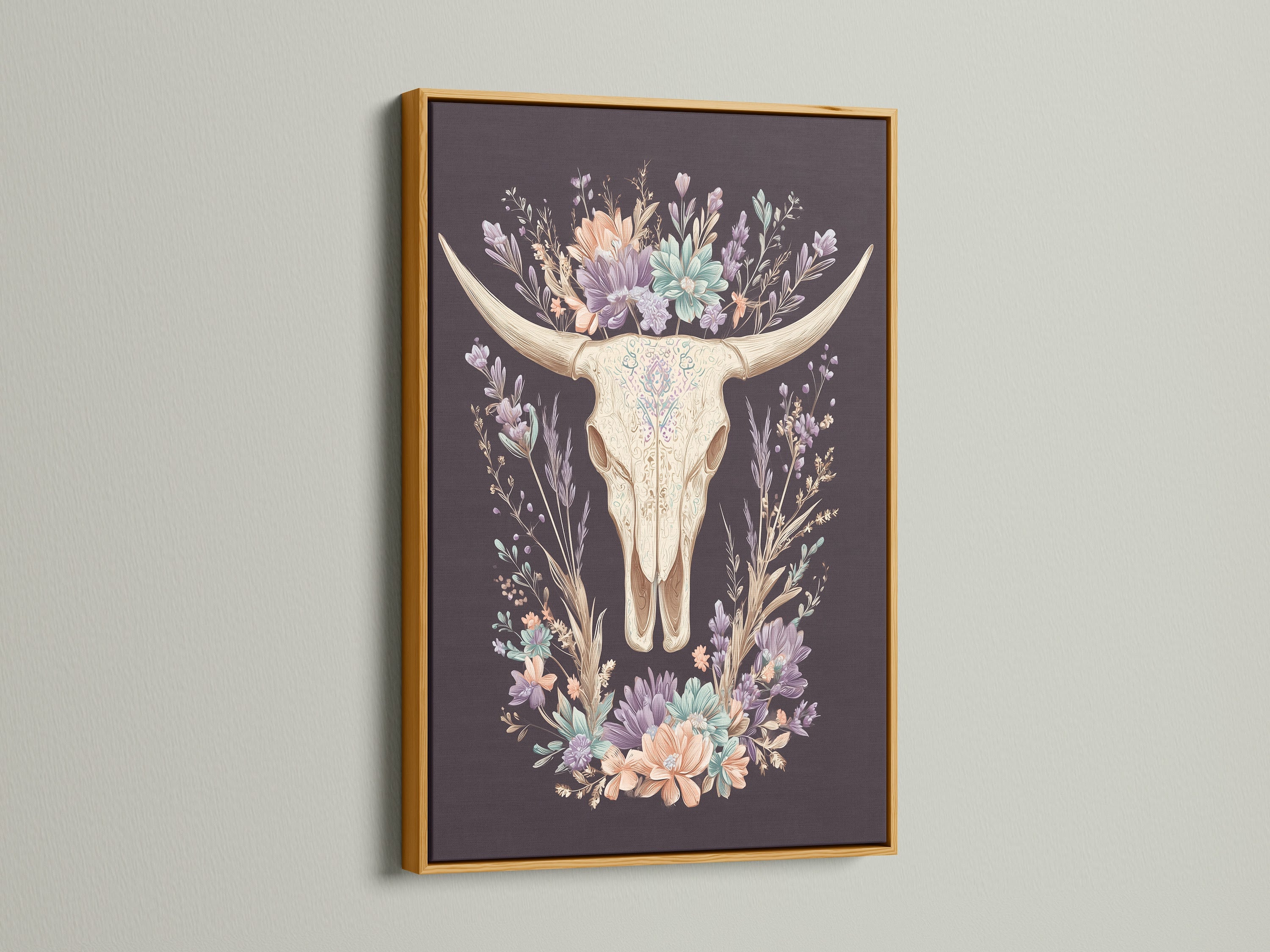 Artwork featuring a bovine skull with floral elements. It is encased in a gold frame. The gold frame adds a touch of elegance and sophistication. The artwork exudes luxury and refinement. It complements opulent interior art styles. Enhance your decor with this exquisite piece.
