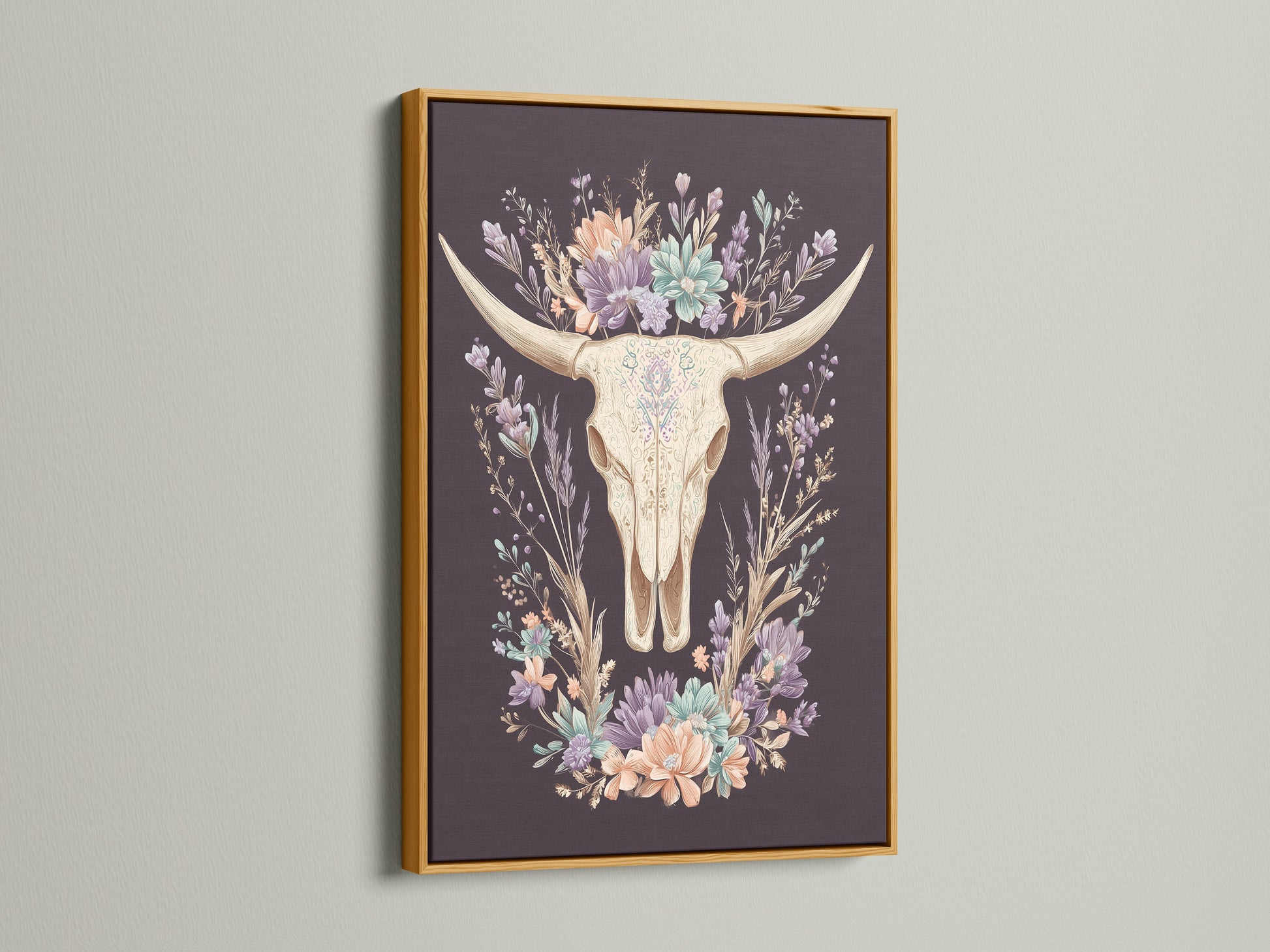 Artwork featuring a bovine skull with floral elements. It is encased in a gold frame. The gold frame adds a touch of elegance and sophistication. The artwork exudes luxury and refinement. It complements opulent interior art styles. Enhance your decor with this exquisite piece.