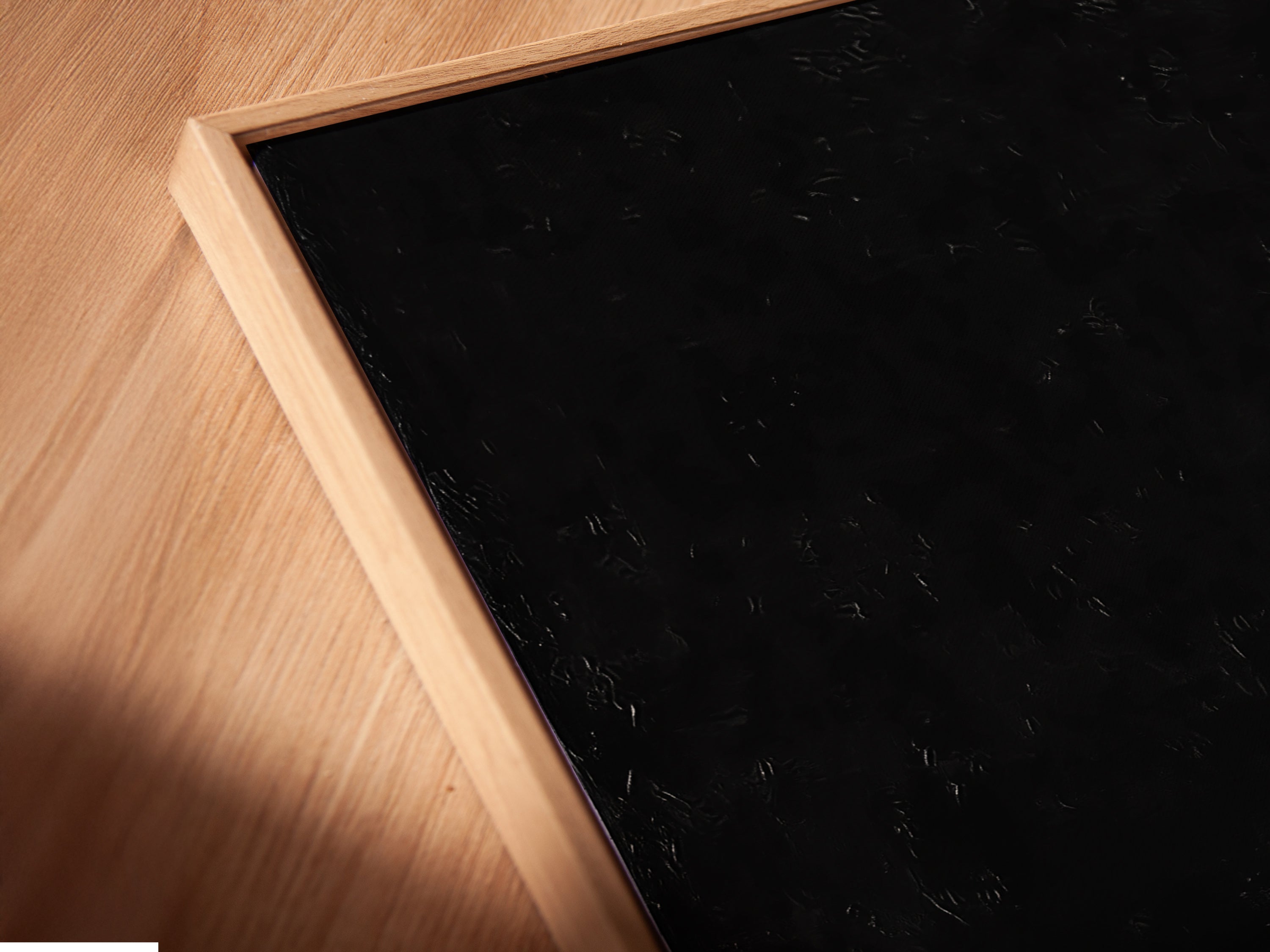 A close-up shows the canvas print in a floating frame. The modern gym weights artwork is featured. This fitness wall art displays an abstract dumbbell design. The floating frame adds a contemporary touch. Enhance your gym decor with this stylish piece.