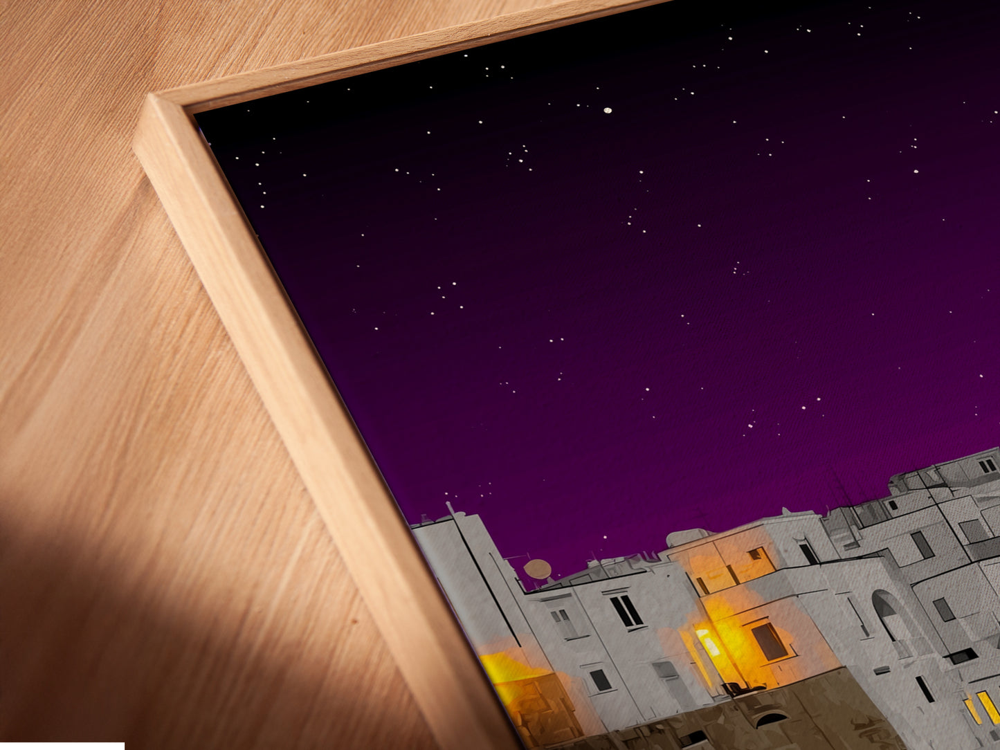 This is a close-up of a canvas print in a floating frame. It highlights the texture and depth of the coastal village artwork. The Mediterranean harbor comes alive with intricate details. Ideal for those who appreciate fine art and quality craftsmanship.