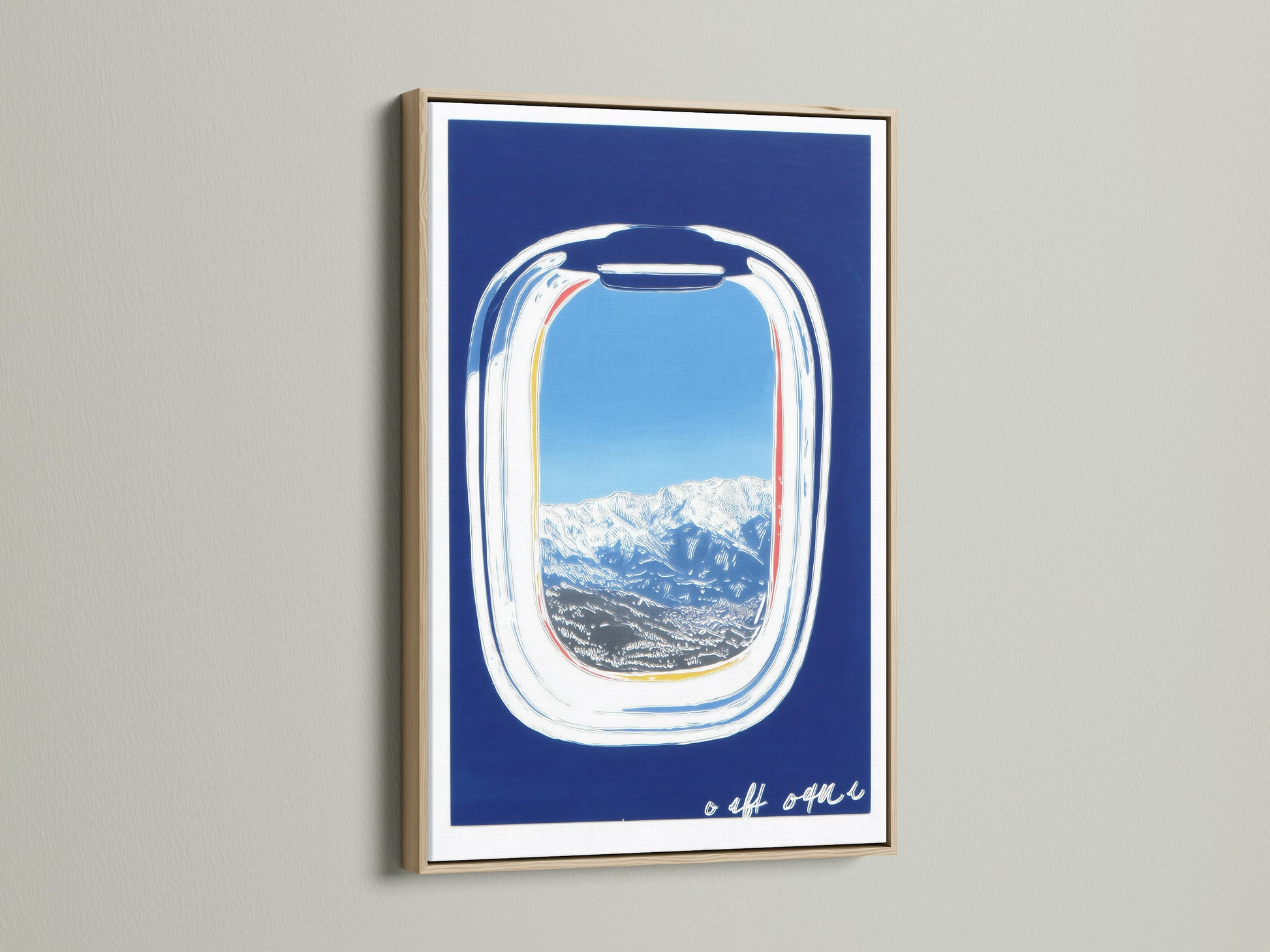 Artwork featuring an airplane window view in an oak frame. The print captures a stunning mountain view under a blue sky. Ideal travel art for modern homes. A serene piece of cabin wall art.