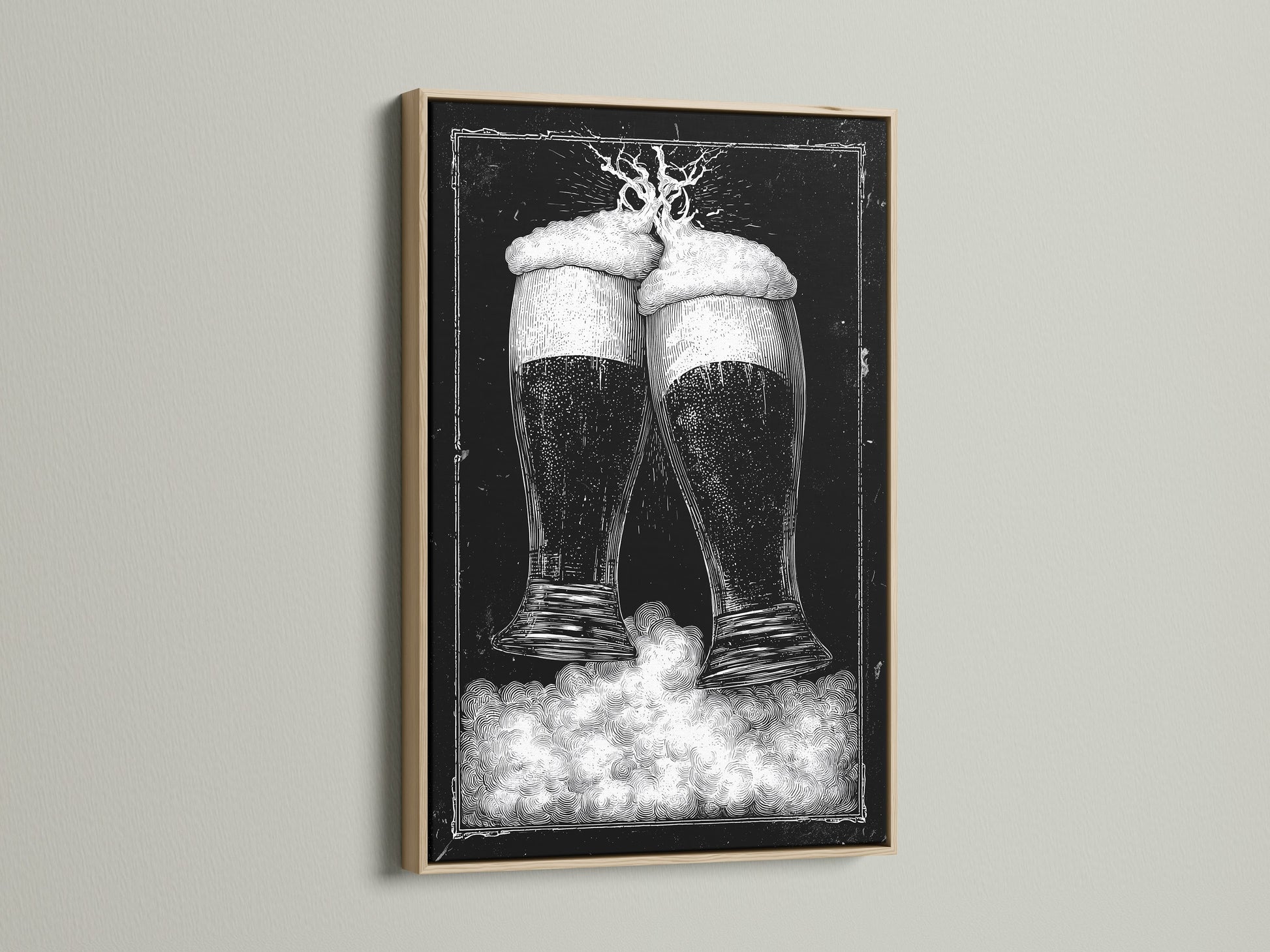 Oak frame artwork. The art features two beer glasses in black and white tones. This piece is mounted on a clean white wall. The frame is a natural oak color. Discover framed artwork options to enhance your space. Explore our selection today for the perfect piece.