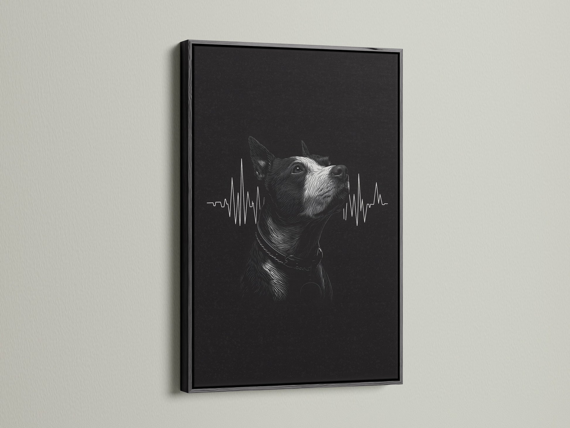 A dog heartbeat artwork is sharply displayed in a black frame. The dark frame provides a bold contrast for the black and white art. This framed print is perfect for a modern veterinary office.