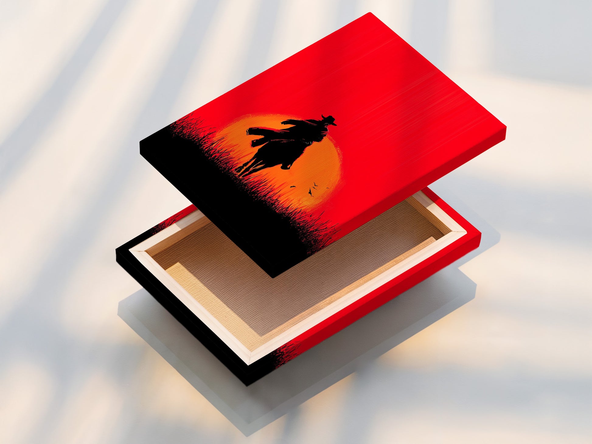 Stretched canvas print of the Cowboy Sunset artwork. The red orange silhouette creates a captivating visual. This western canvas print is ideal for rustic themed spaces. Add a touch of the Wild West to your living room bedroom or man cave.