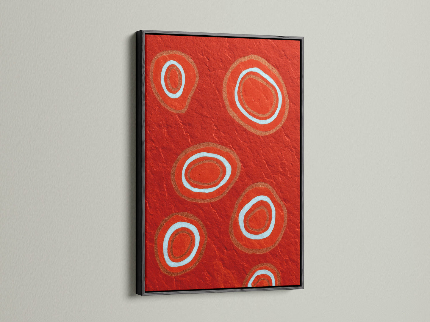 This black frame accentuates the bold abstract red art. The geometric canvas print is a modern wall decor statement. The circle artwork pops against the dark frame. It adds sophistication to any living space. Ideal for those seeking a contemporary art piece. The black frame provides a sleek finish.
