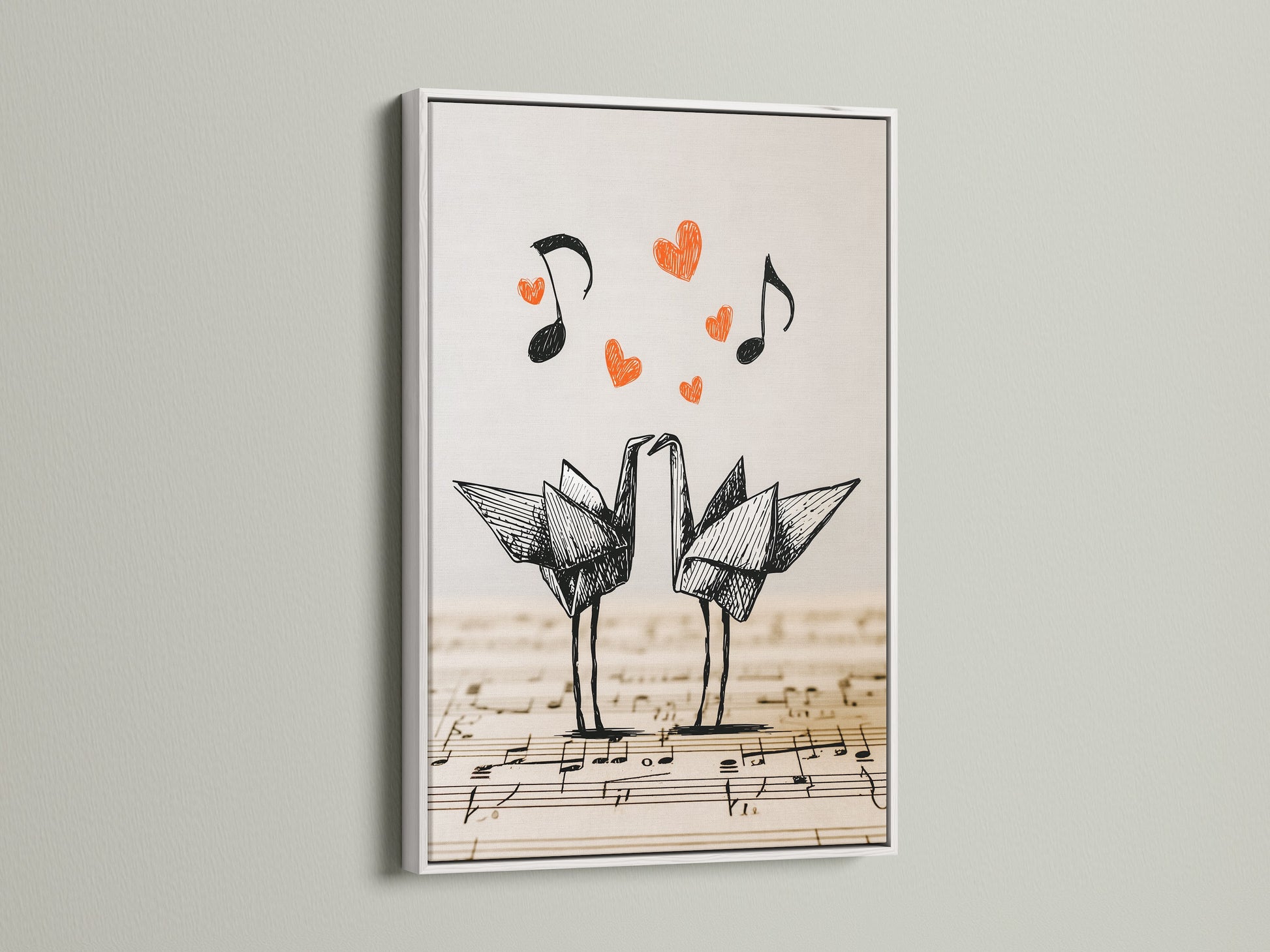 Origami cranes artwork framed in white. The artwork depicts two origami cranes on a music sheet backdrop. Floating hearts and music notes create a love theme. The white frame offers a clean modern look.