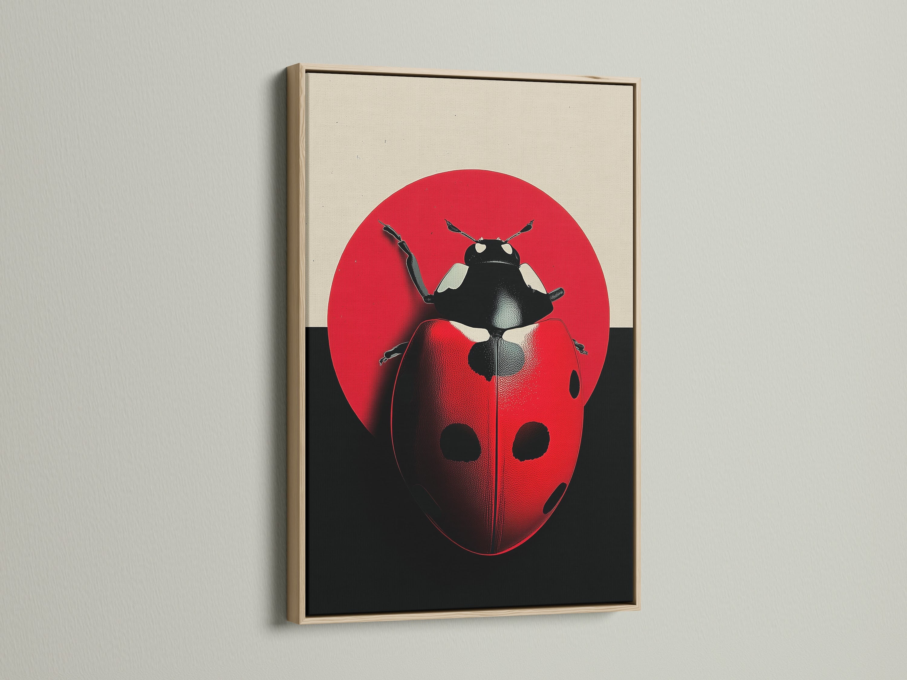 A close-up of an oak frame showcasing ladybug artwork. The red insect wall art adds a touch of nature. It is perfect for a modern nursery. The minimalist beetle canvas print complements any contemporary space. It is ideal for kids room decor.