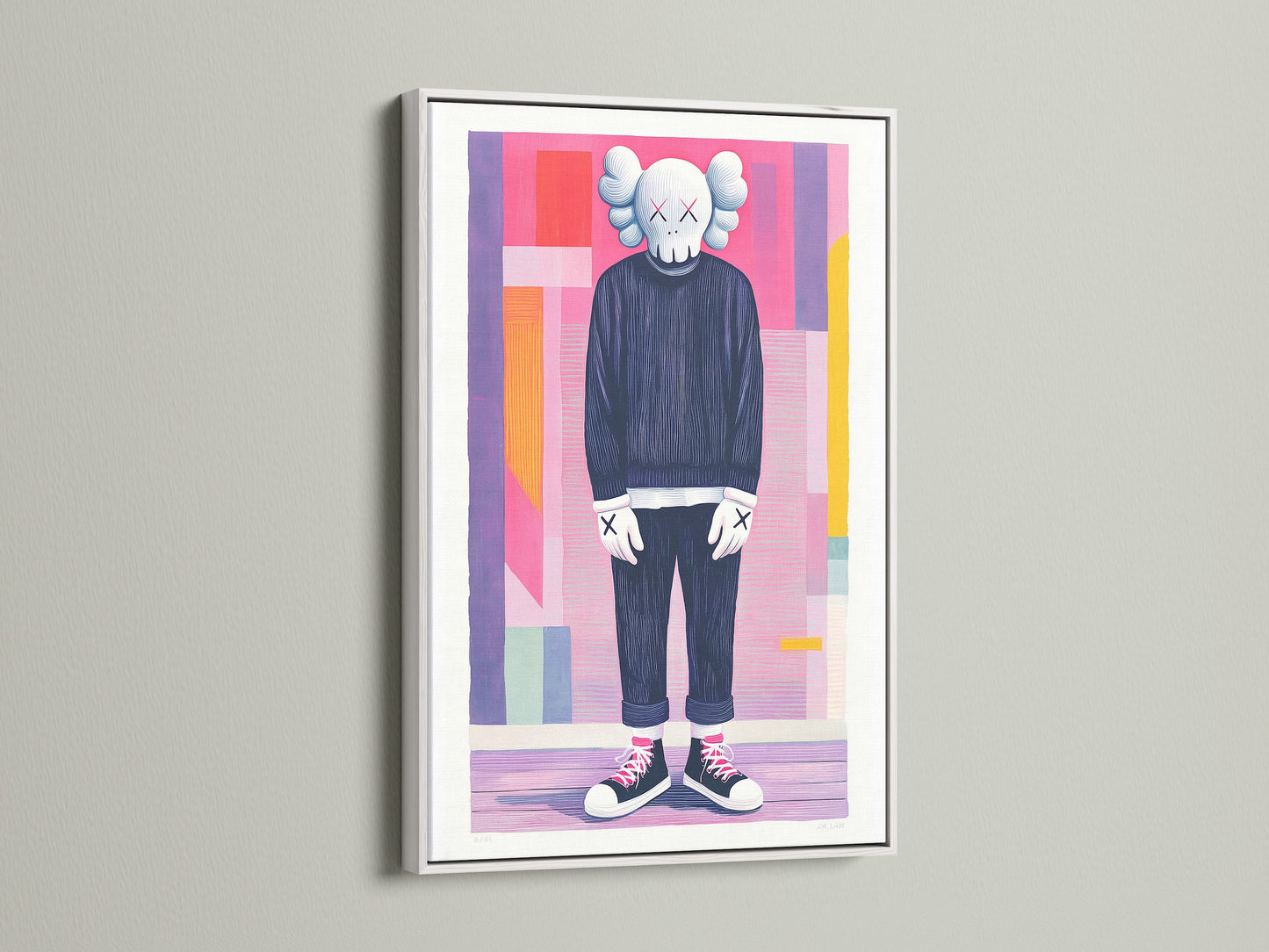 This artwork features a human-like figure with a skull head. It is displayed in a clean white frame. The frame contrasts against the colorful artwork. The bright white frame adds a modern touch. This artwork is mounted on a white wall.