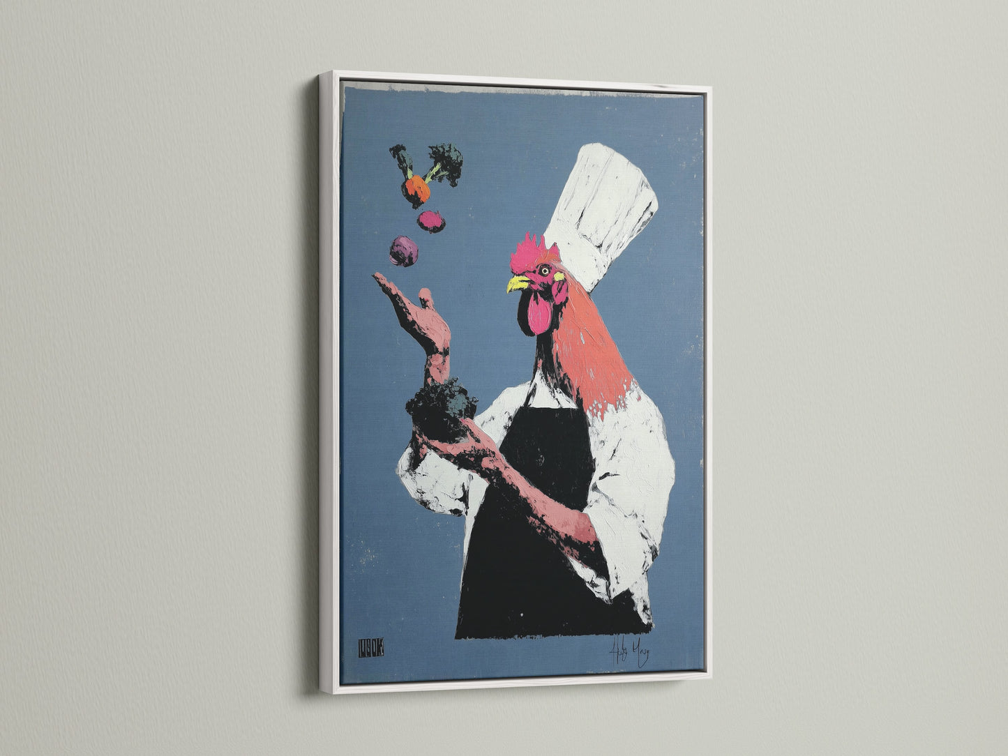 Rooster Chef canvas print in a white frame. The white frame enhances the artwork's vibrant colors. It is a great addition to any kitchen or dining area. This quirky animal art brings a light and airy feel to your space. See how this white frame option complements the art.