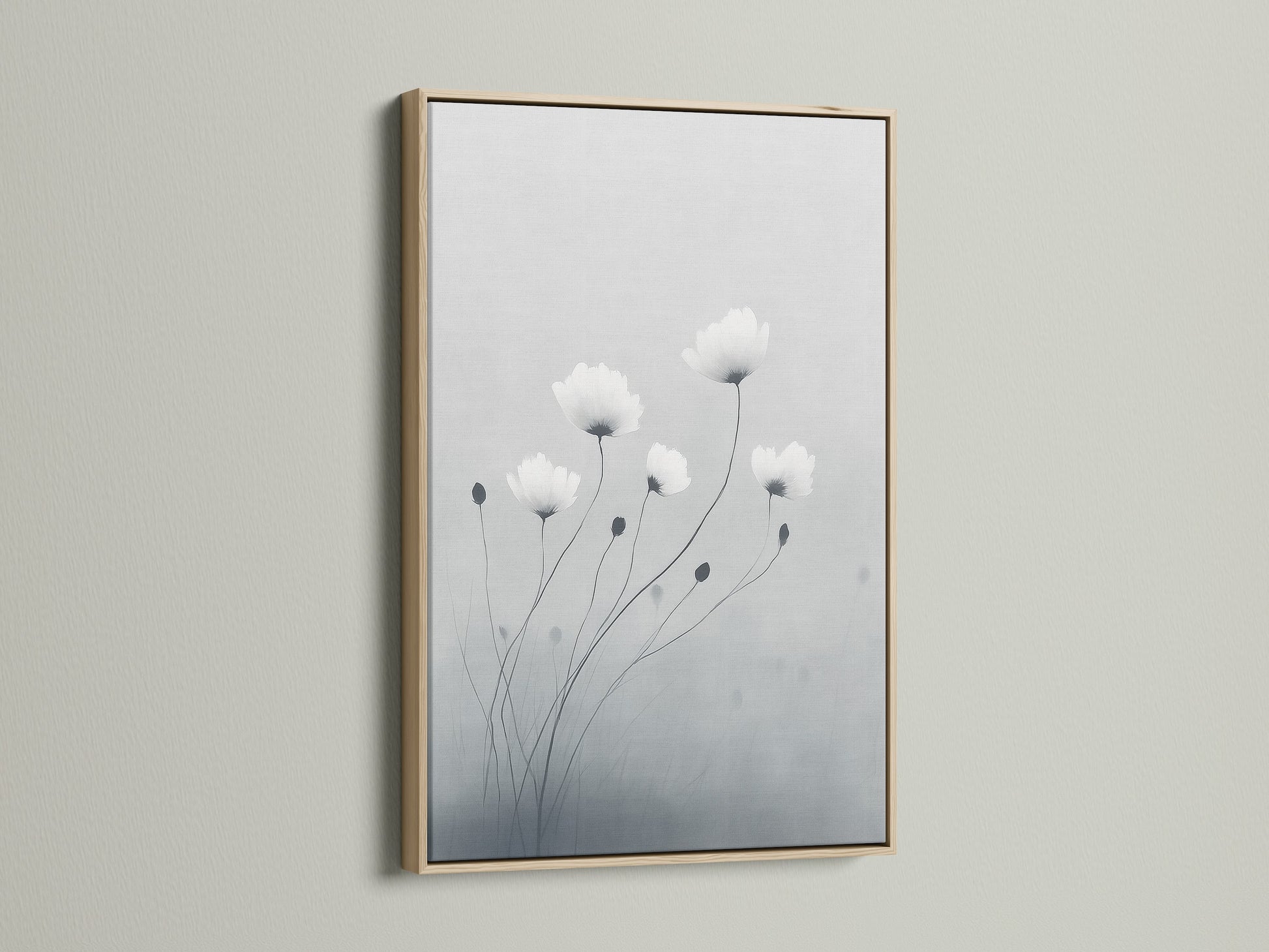 This minimalist flower artwork is framed in oak. The soft gray and white botanical print offers a serene touch. It enhances bedroom decor or any space needing a modern canvas art piece. Oak frames add a natural element and elevate minimalist wall art.
