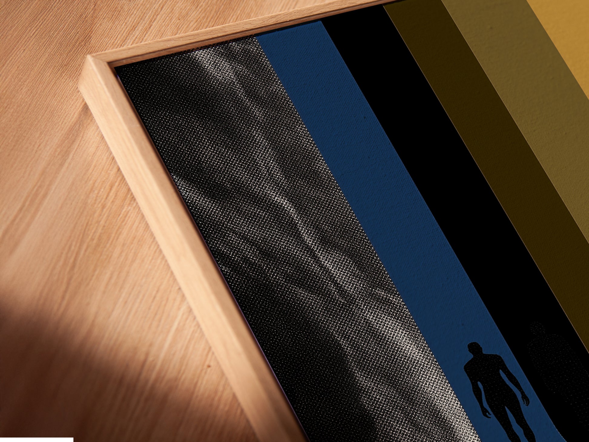 A close-up of a canvas print in a floating frame. The modern abstract artwork features a mountain river scene. The floating frame gives a sleek contemporary look. Elevate your wall decor with this unique piece.