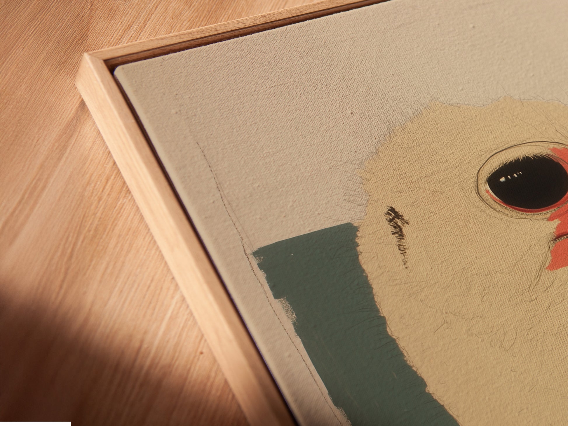 Close-up of a canvas print in a floating frame. The floating frame adds dimension to the art. It gives the illusion of the art floating. This enhances the artwork's visual appeal. The frame offers a modern touch.