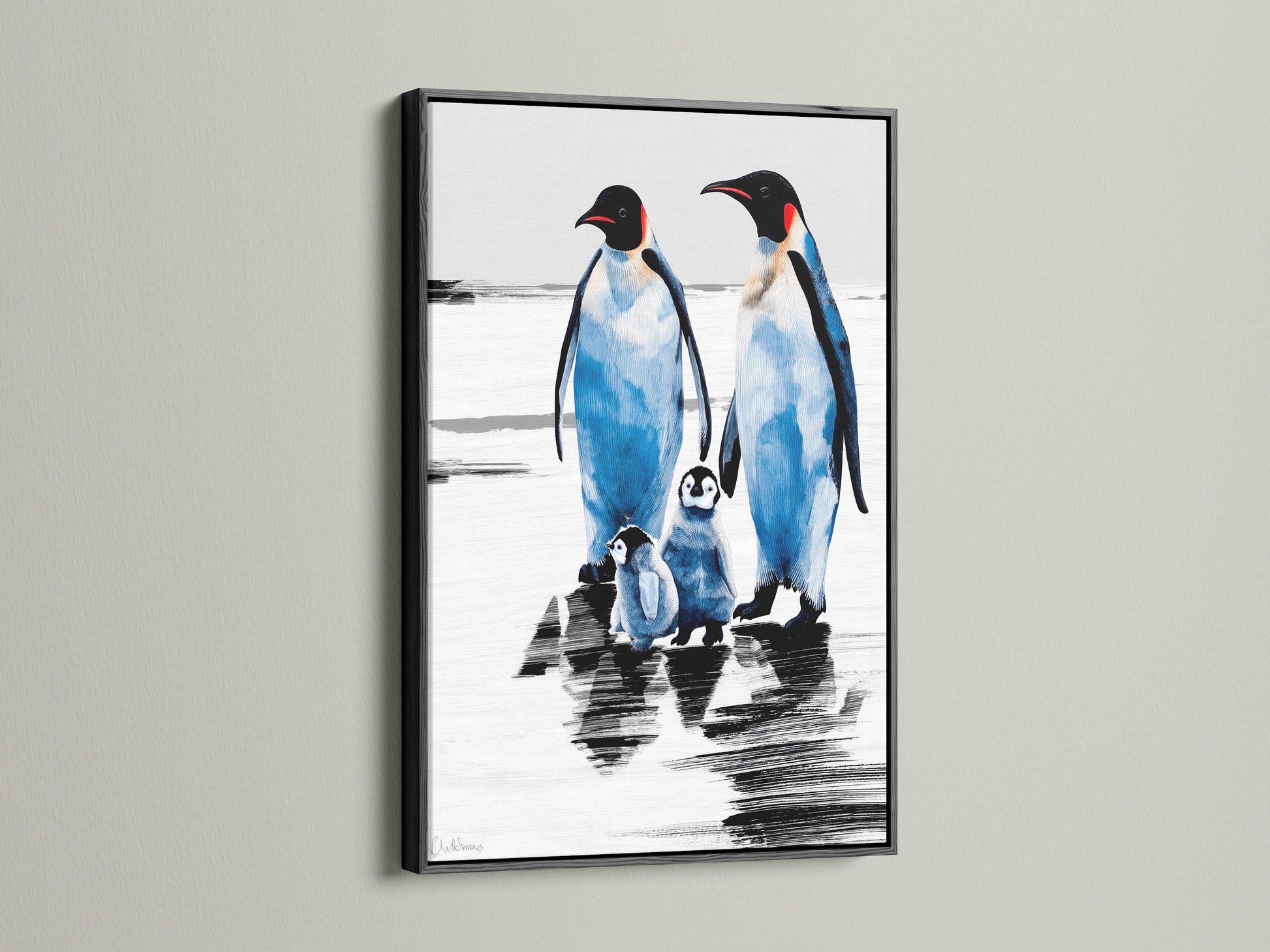 A family of penguins in a black frame. This bird art print is a unique piece of coastal decor. Perfect for homeowners renters and parents seeking distinctive wall art for living rooms bedrooms or nurseries.