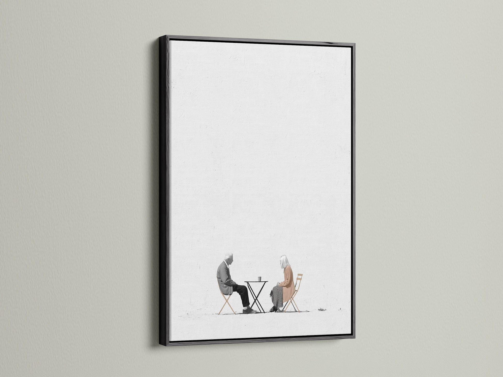 Add a touch of simple sophistication with this minimalist piece. It depicts an elderly couple enjoying coffee. The black frame offers a sleek modern touch. It is perfect for creating a focal point. Ideal for minimalist Scandinavian or eclectic styles. A stunning addition to any space.