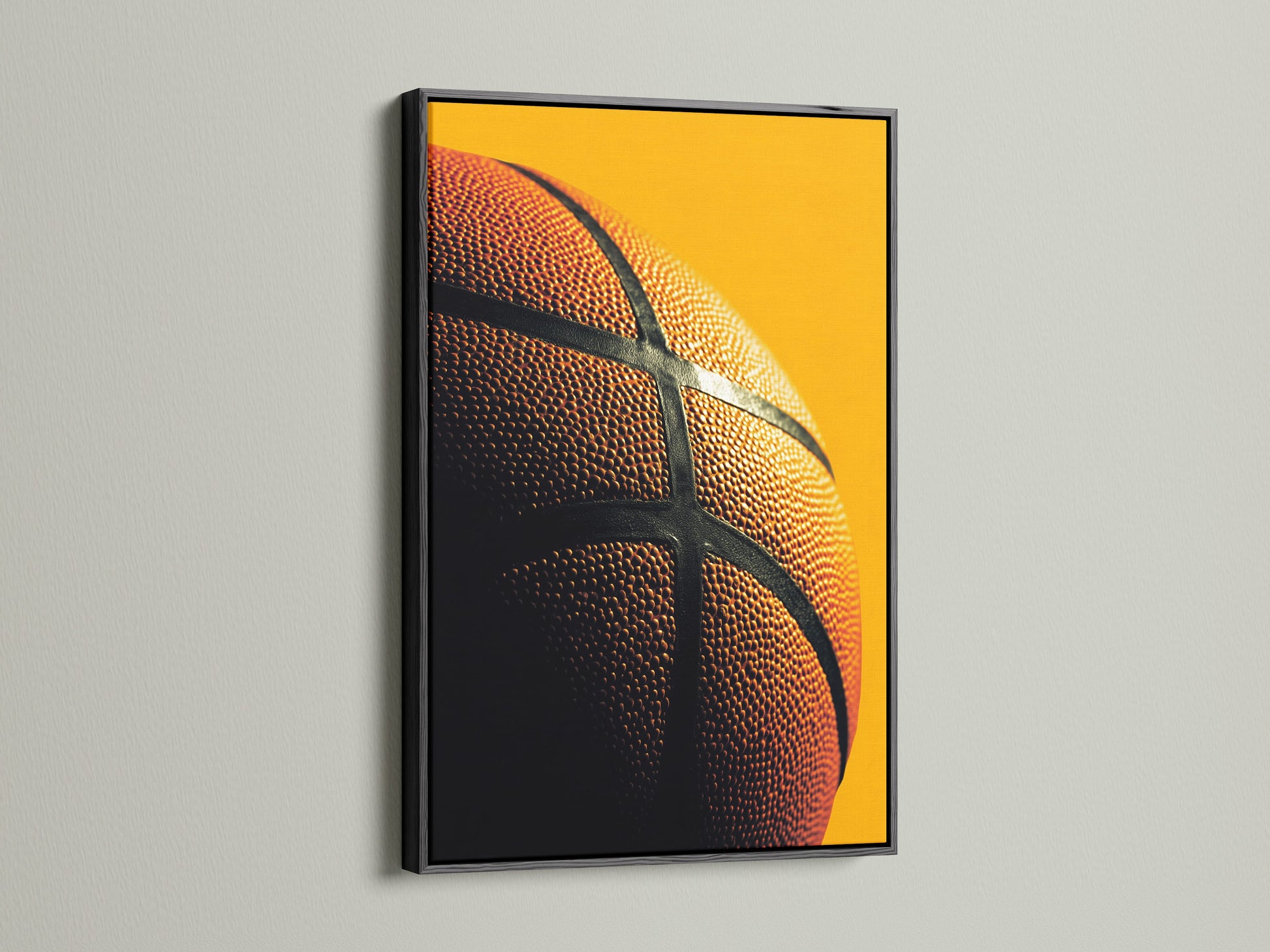 Basketball artwork in a sleek black frame. The black frame offers a classic and sophisticated look. Make a statement with framed art. The artwork will complement any decor. Find the perfect addition to your home.