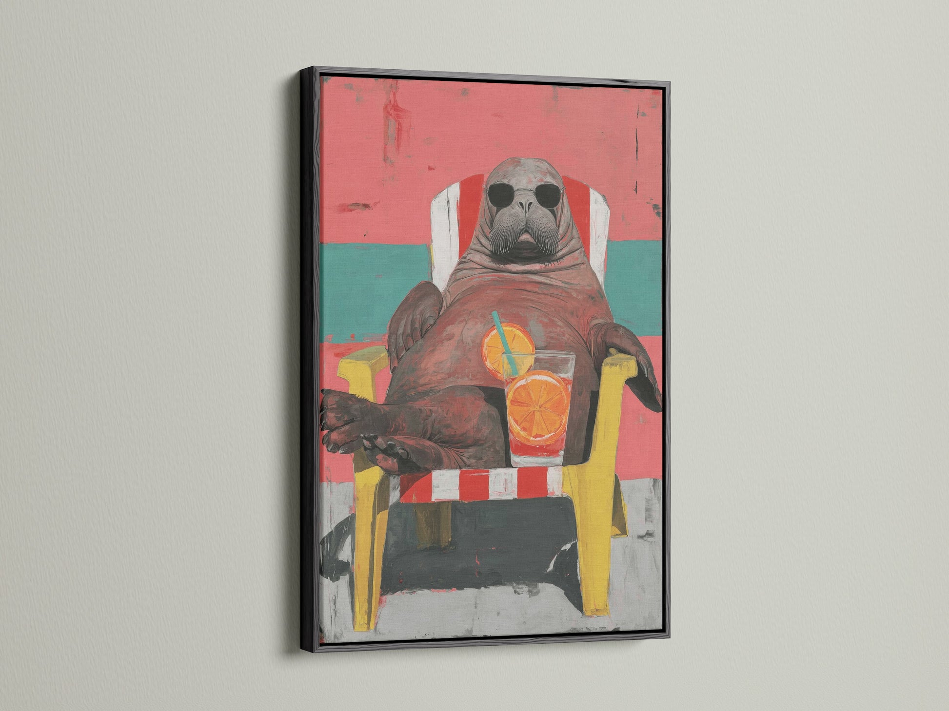 This image features the Walrus Wall Art Print in a black frame. The artwork showcases quirky animal art with a retro design. It's perfect for enhancing beach house decor with summer vibes. The coral pink and teal colors make it pop. This piece is ideal for adding a coastal touch to your home.