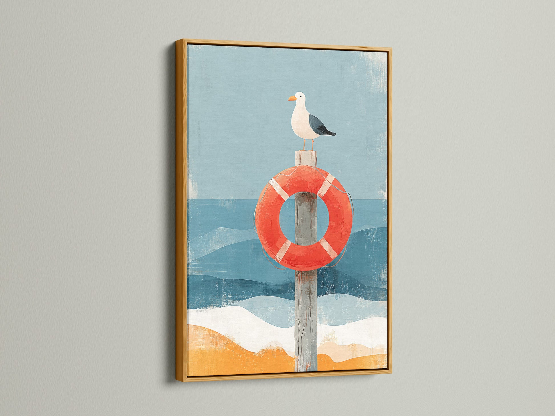 Artwork featuring a seagull perched on a red life preserver. The art is framed in a gold wooden frame. The artwork has a coastal nautical theme. The gold frame provides an elegant touch.