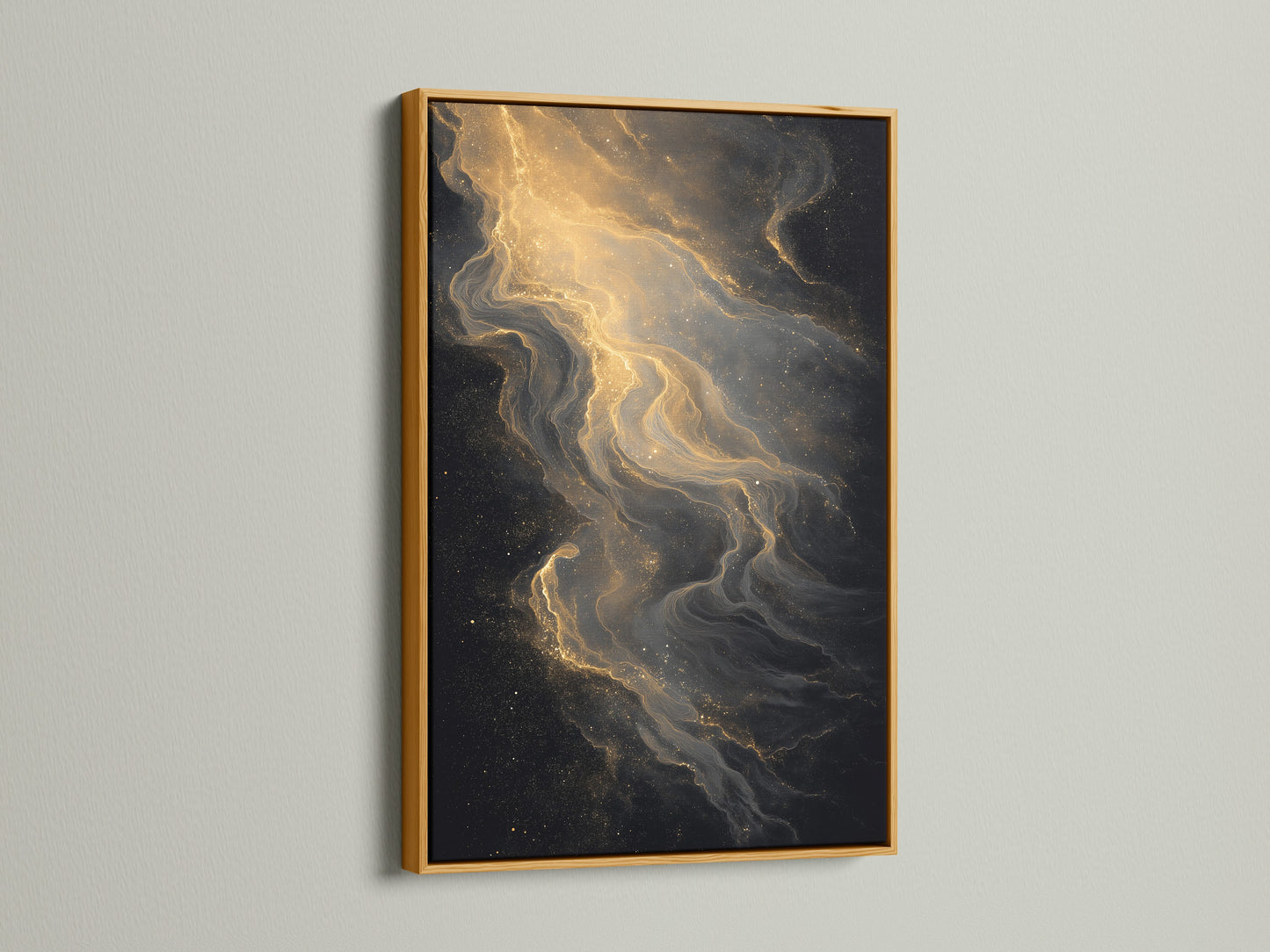 A framed artwork with a gold frame hangs on a wall. The artwork features a captivating abstract art with gold and black ink patterns. The gold frame exudes luxury and elegance. Make a statement with this exquisite piece.