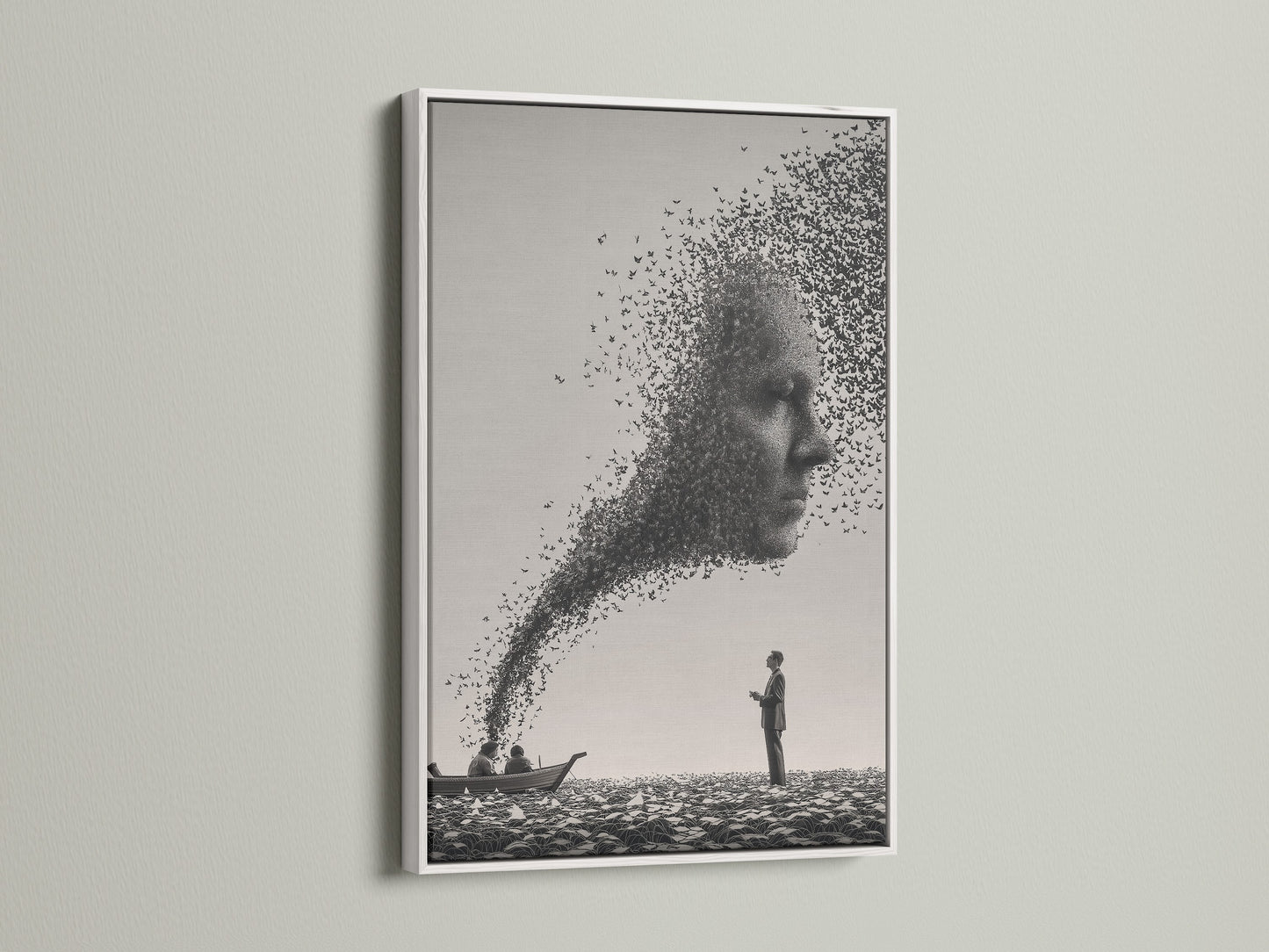Artwork with a white frame on a white wall. The art features a man on a beach. A face made of birds is also featured. The white frame provides a clean and modern look. It complements the artwork without overpowering it. Discover the elegance of white framed art.