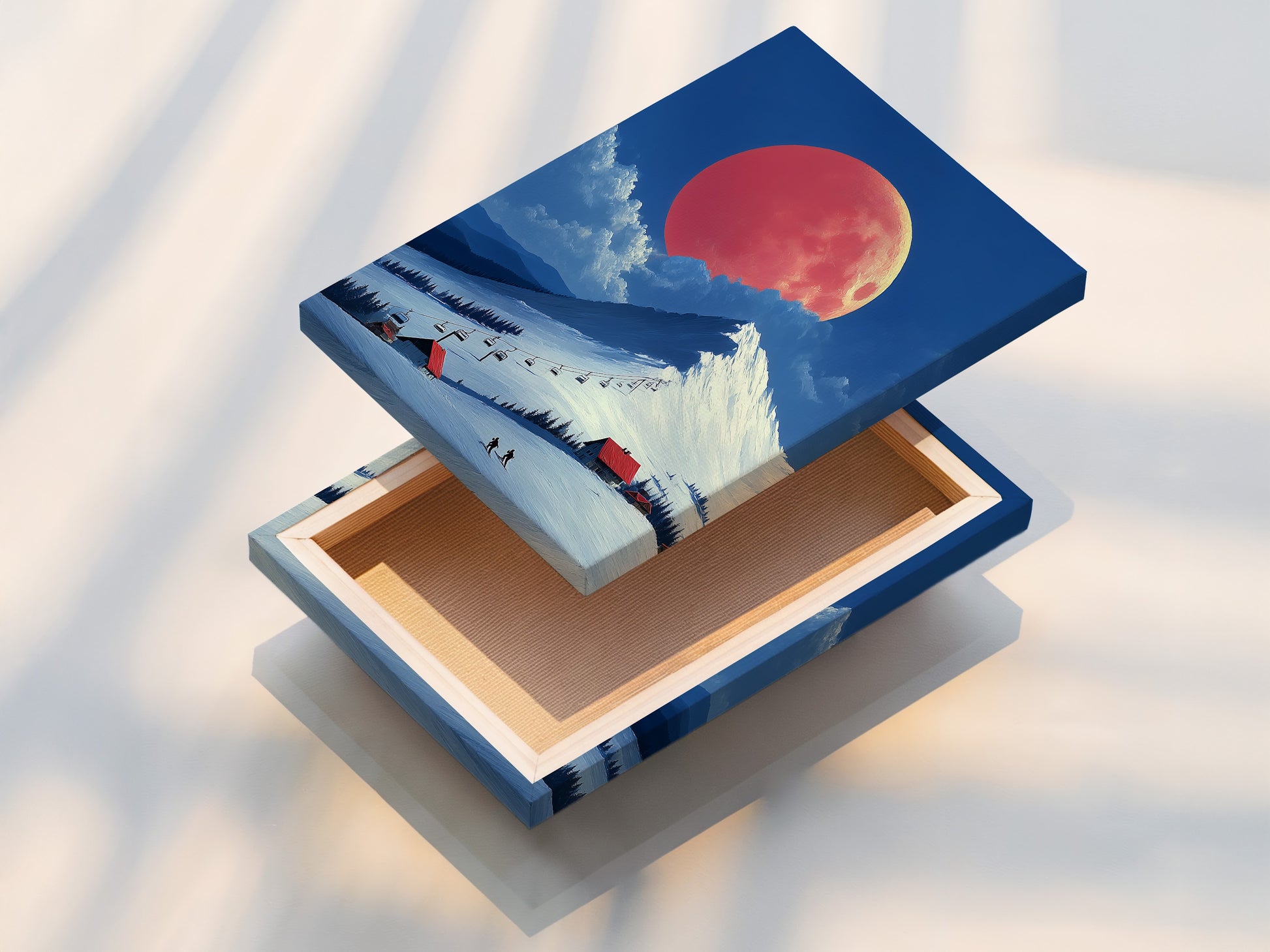 This is a stretched canvas print of ski resort artwork. The winter scene features an alpine mountain landscape. The coral moon adds a touch of magic. It's ready to hang and enjoy in any room. This canvas print brings the beauty of winter indoors.