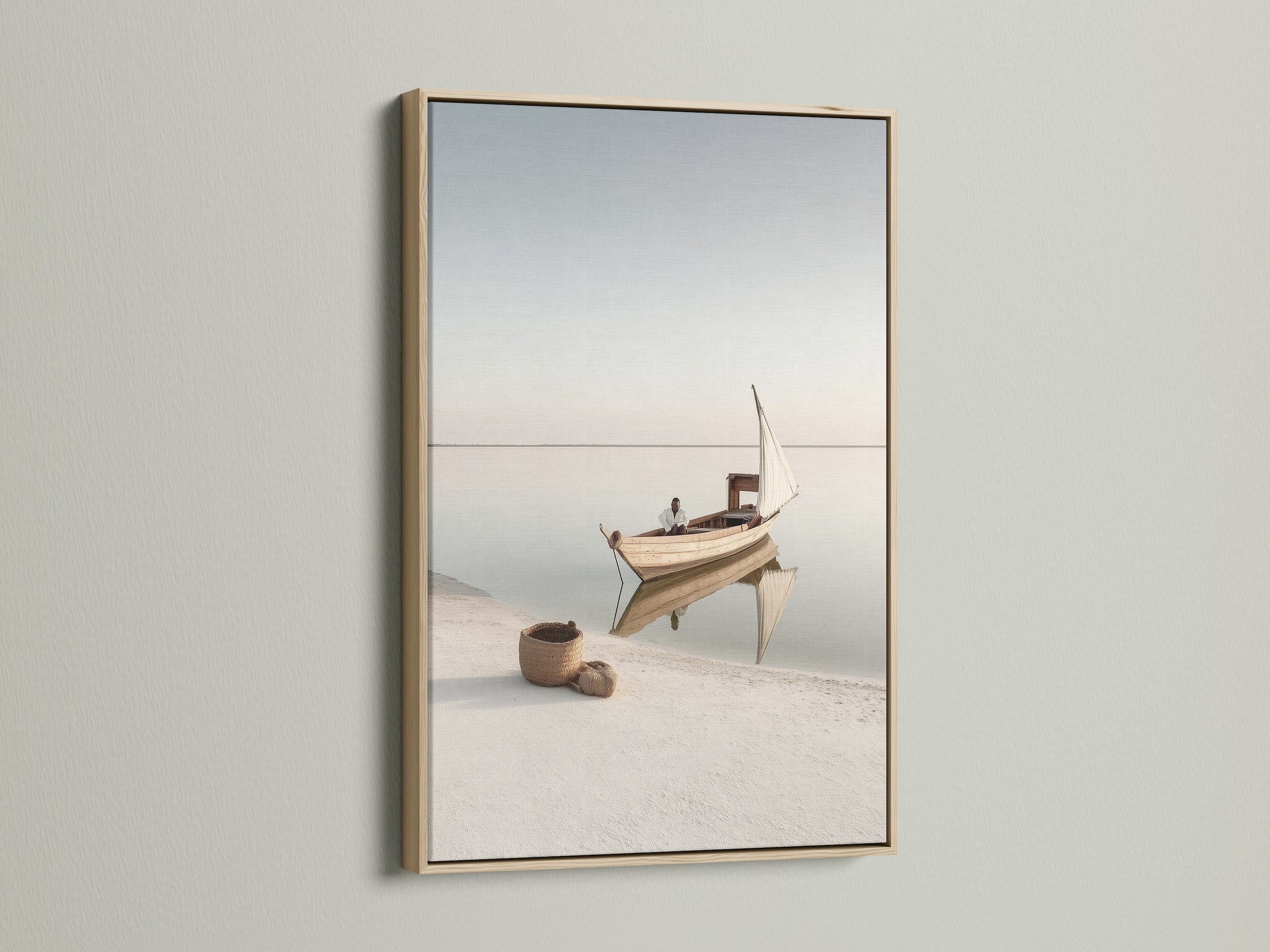 Sailboat Canvas Print in an oak frame. Enhance your space with this neutral coastal canvas. A minimalist nautical print that brings a beachy vibe to any room. The ocean view is so calming.