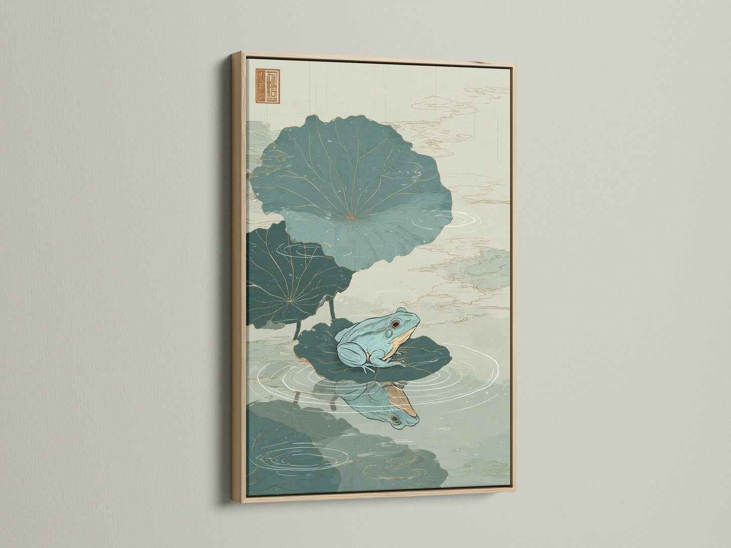 Artwork featuring a green frog sitting on a lily pad in an oak frame. The oak frame enhances the artwork's natural theme. This framed artwork is a stylish addition to your home decor. Discover the beauty of framed art. Elevate your space with this stunning piece.