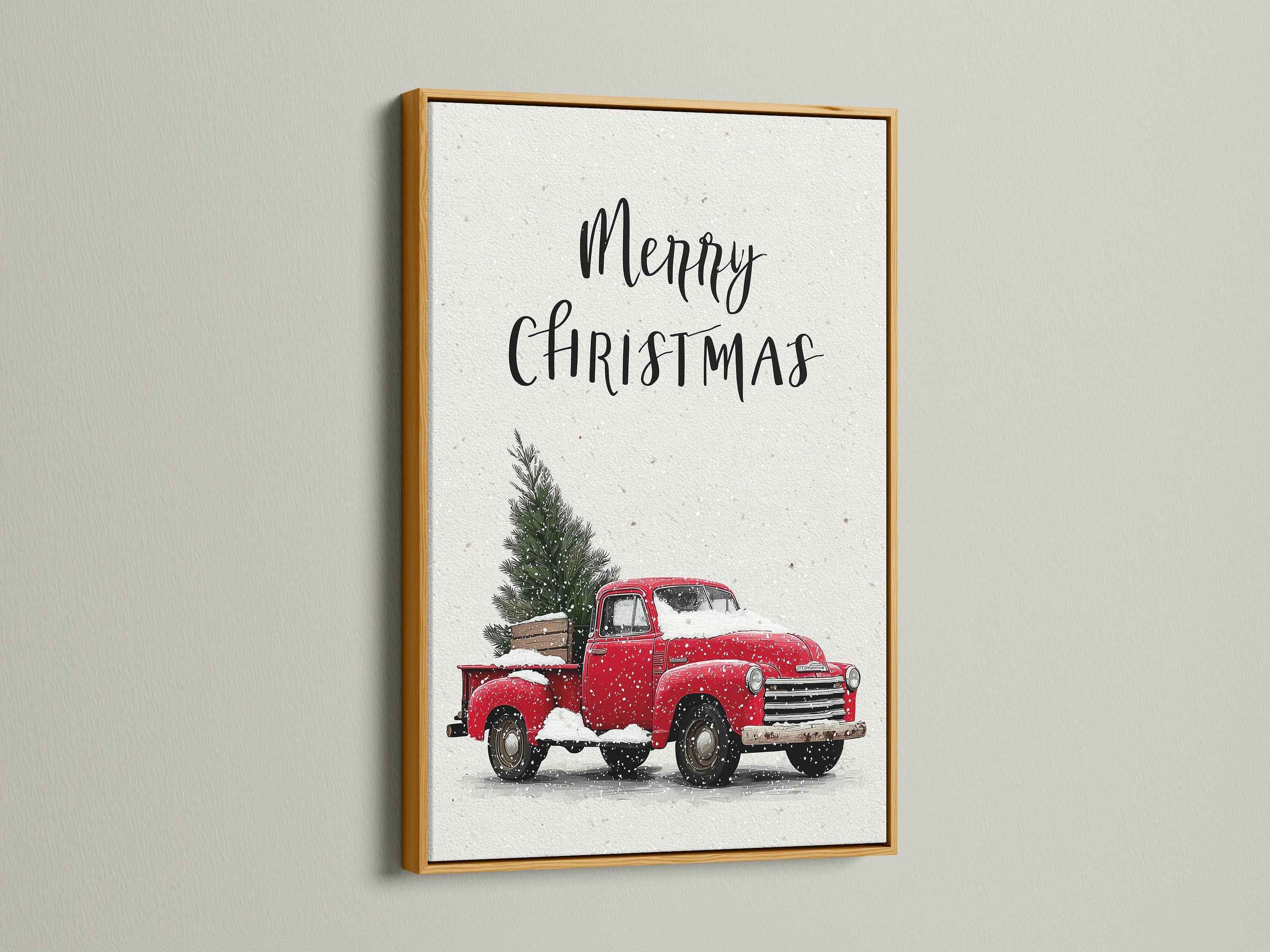 Artwork featuring a gold frame. The artwork showcases a Christmas scene. A red truck is carrying a Christmas tree covered in snow. The gold frame adds a touch of elegance and luxury. This art is perfect for seasonal home decor. It elevates any space.