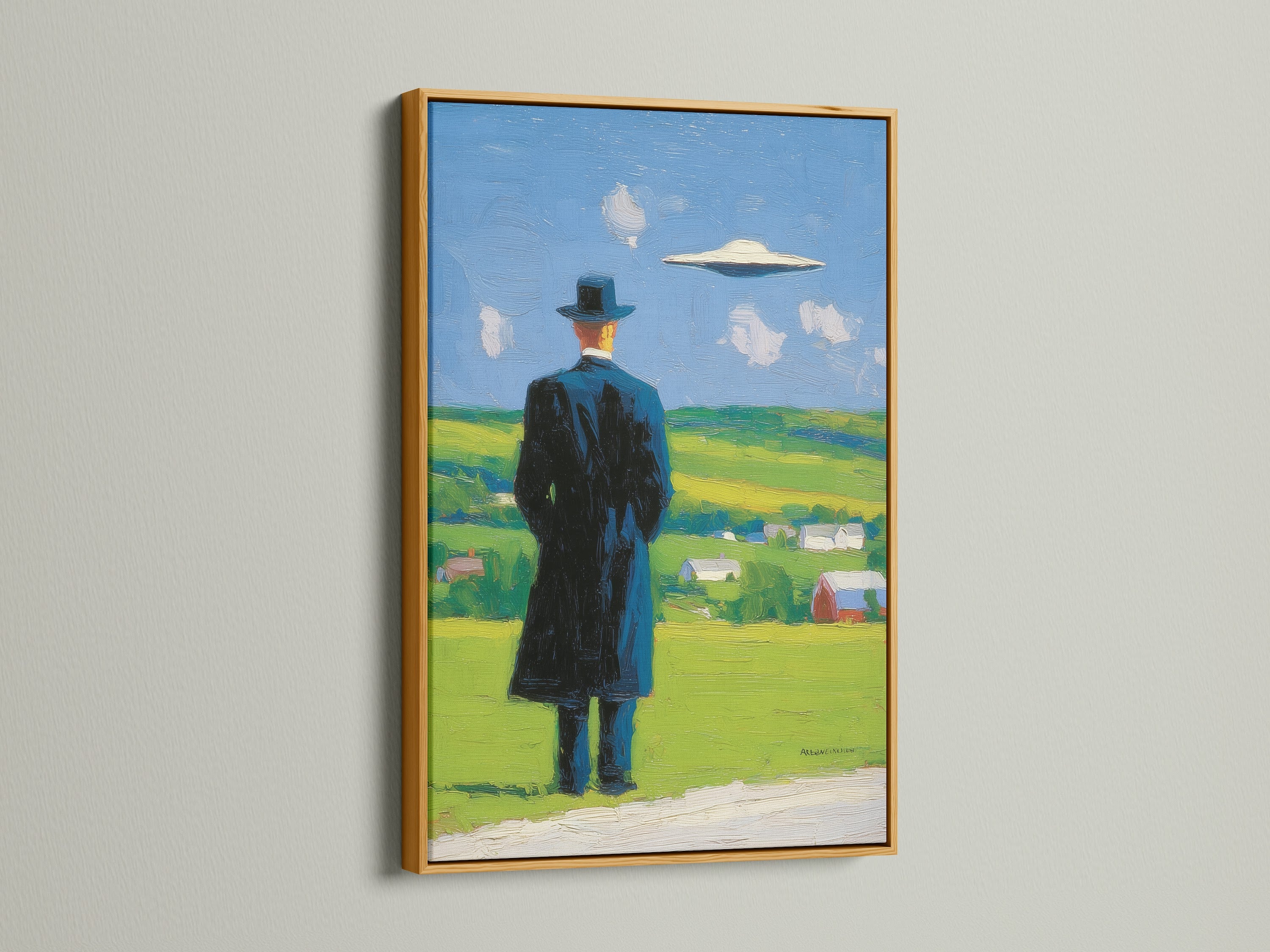 Contemporary art in a gold frame. This surreal wall art features a mysterious man and a UFO. Elevate your home or office wall decor with this landscape painting. It fits rustic and eclectic styles.