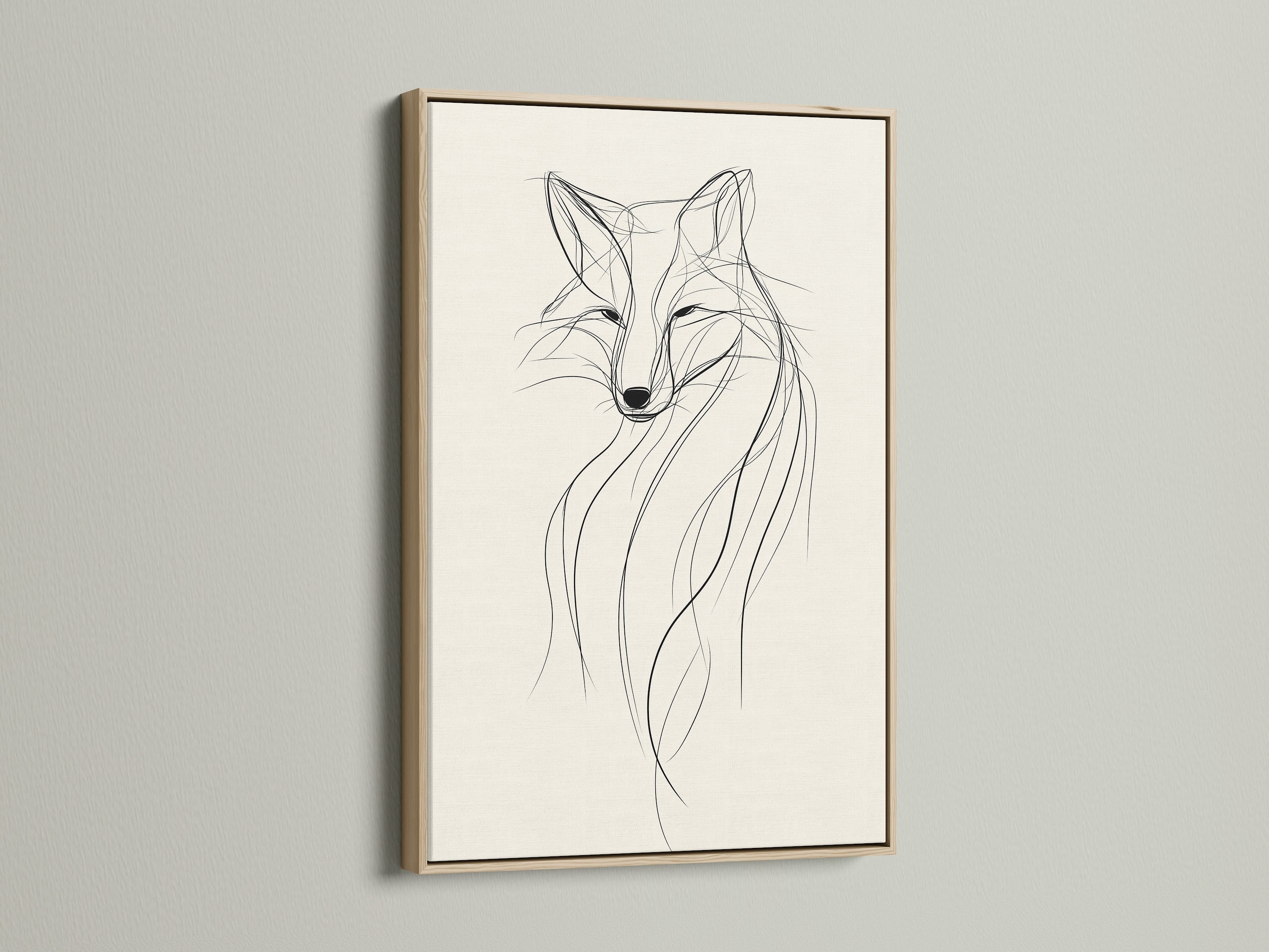 A close-up shows an oak frame enhancing minimalist fox line artwork. The oak's natural wood grain adds warmth. This modern wildlife art is suitable for Scandinavian styles. It provides a neutral decor option. Perfect for a calming bedroom or living space.