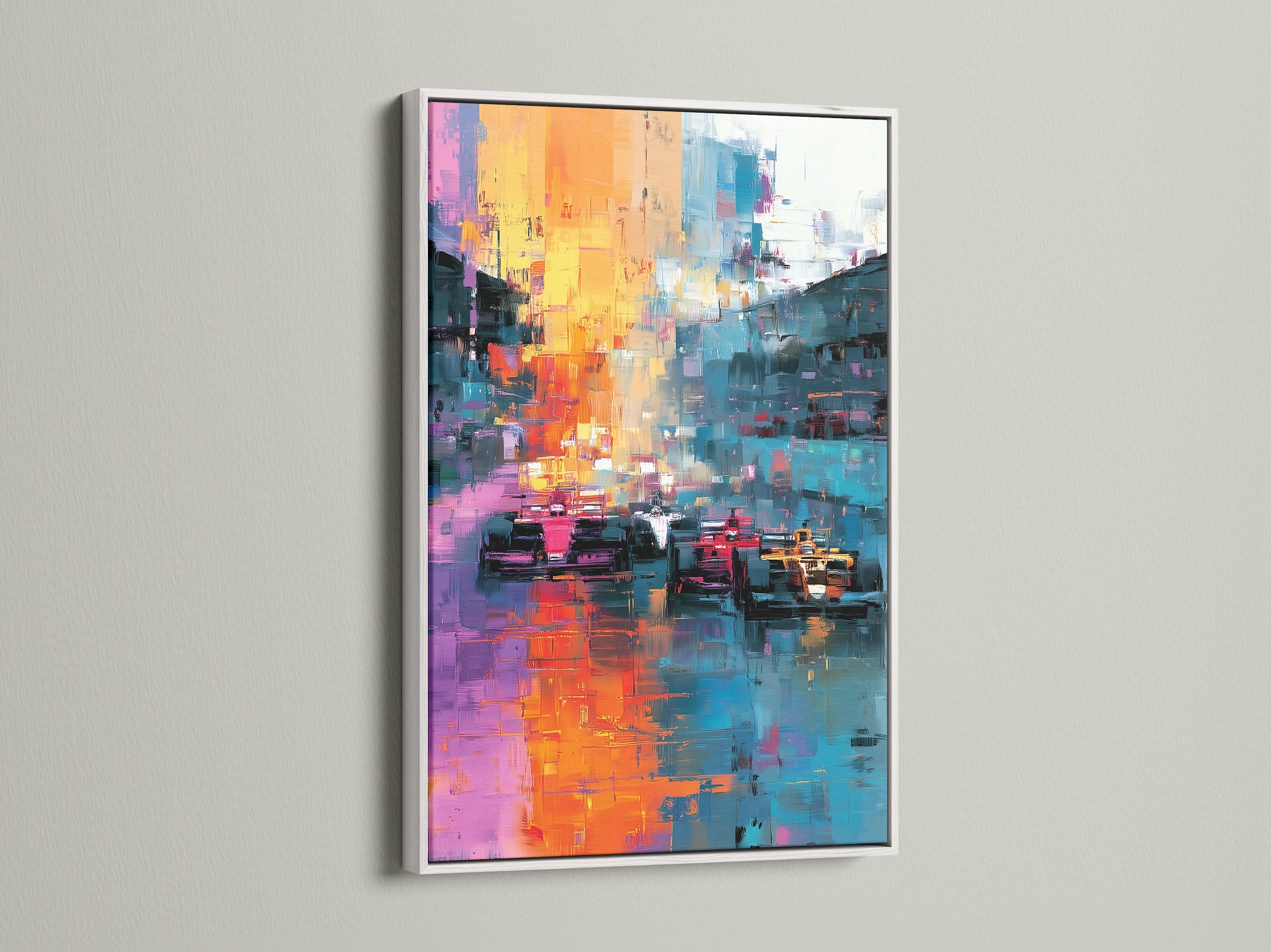 Abstract race car artwork framed in white hangs on a wall. The white frame gives a modern look. The art brightens the space. This artwork adds style to your home. The artwork is ready to hang.