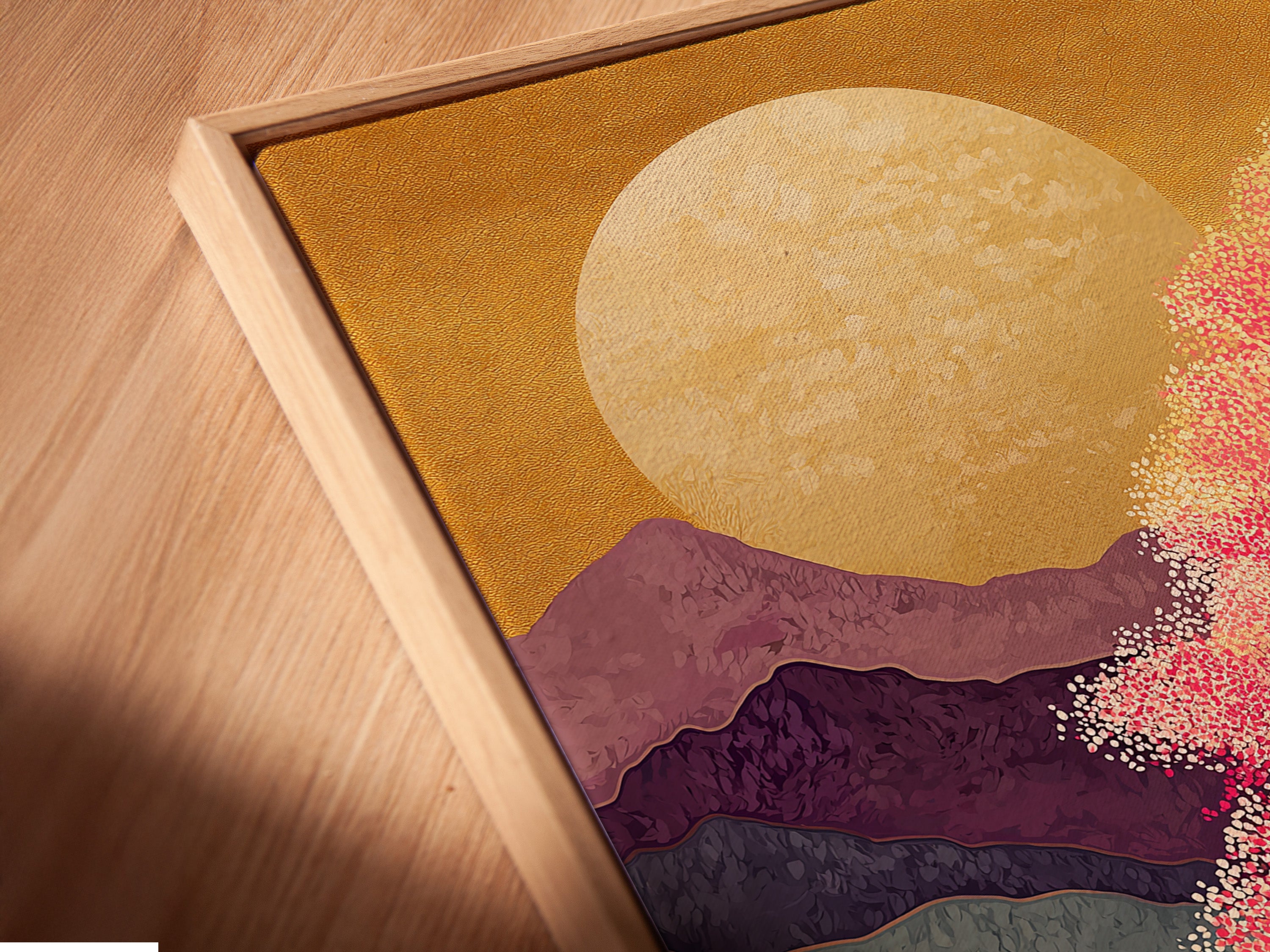 An angled close-up shows a canvas print in a floating frame. The Japanese Cherry Blossom artwork is featured. The artwork features a pink sunset mountain landscape. It provides zen wall decor. The floating frame enhances the artwork.