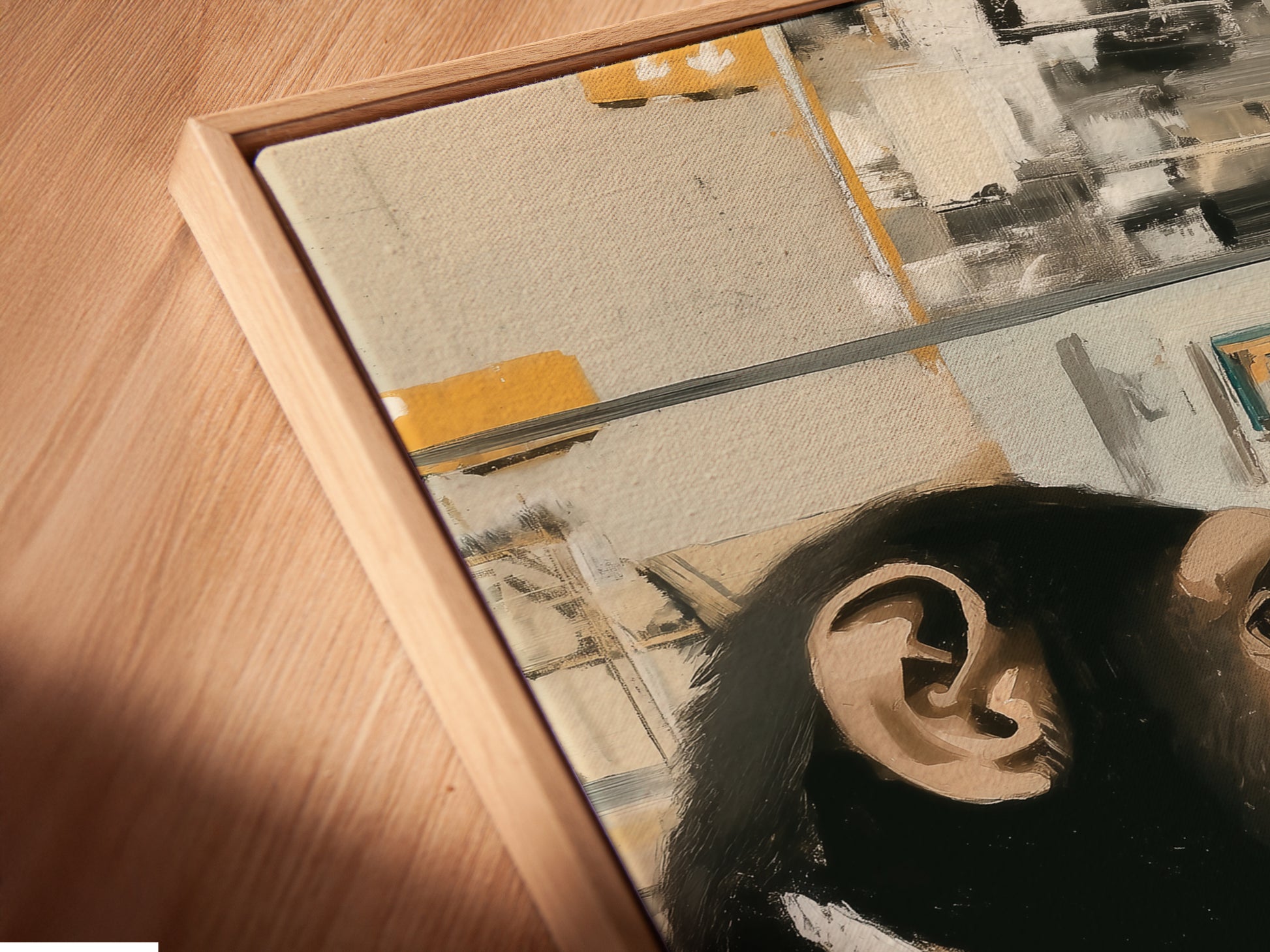 A close-up angled view showcases a canvas print in a floating frame. The Monkey Office Art Print features a chimp at a computer. The floating frame gives the artwork a modern look. This funny animal artwork is perfect for any office. It is a great way to add humor to your decor.