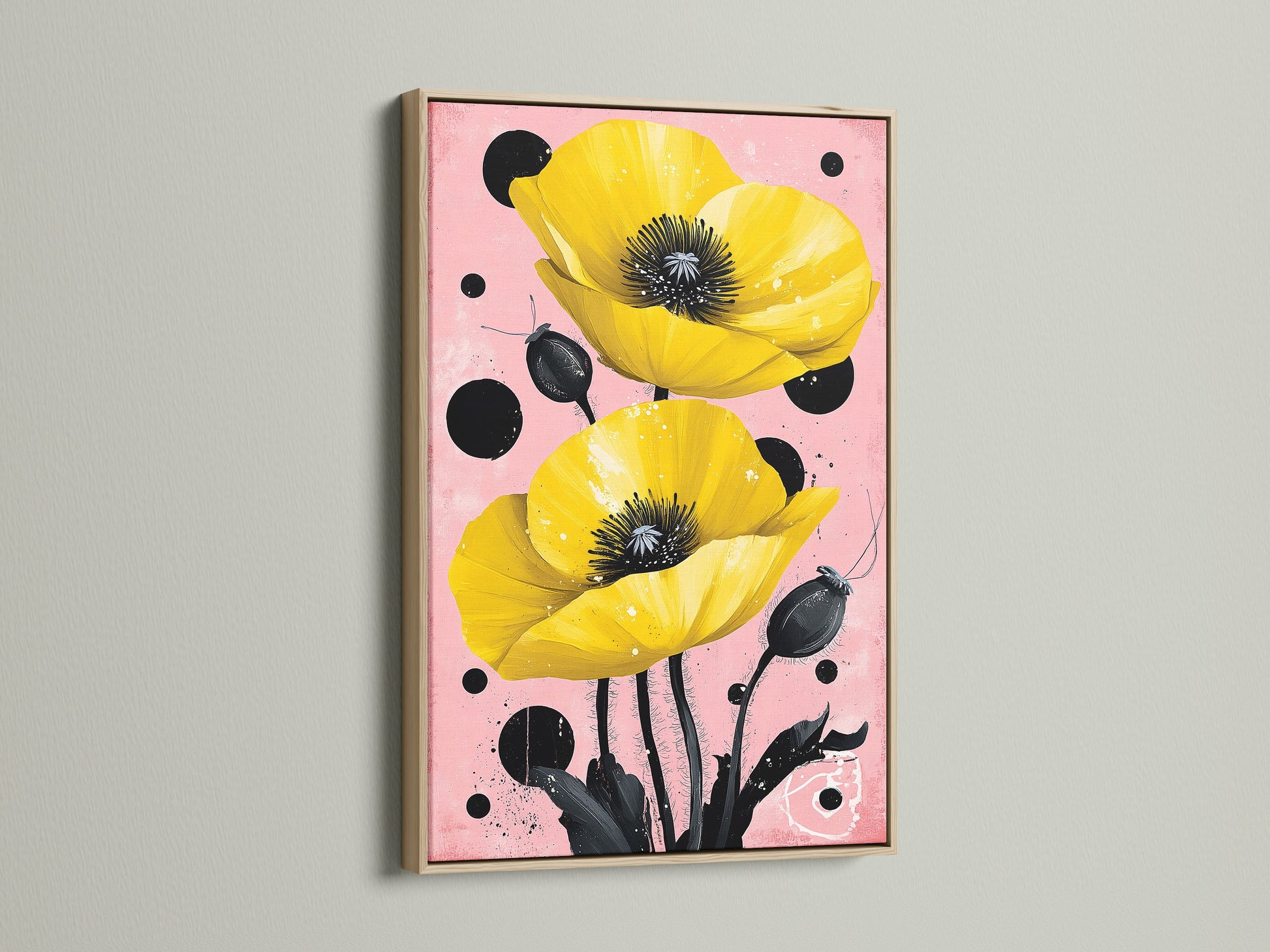The Yellow Poppy canvas artwork is displayed in an oak frame. The floral wall art has botanical elements perfect for bedroom wall decor. The pink and black colors offer a modern look. The natural wood adds warmth.