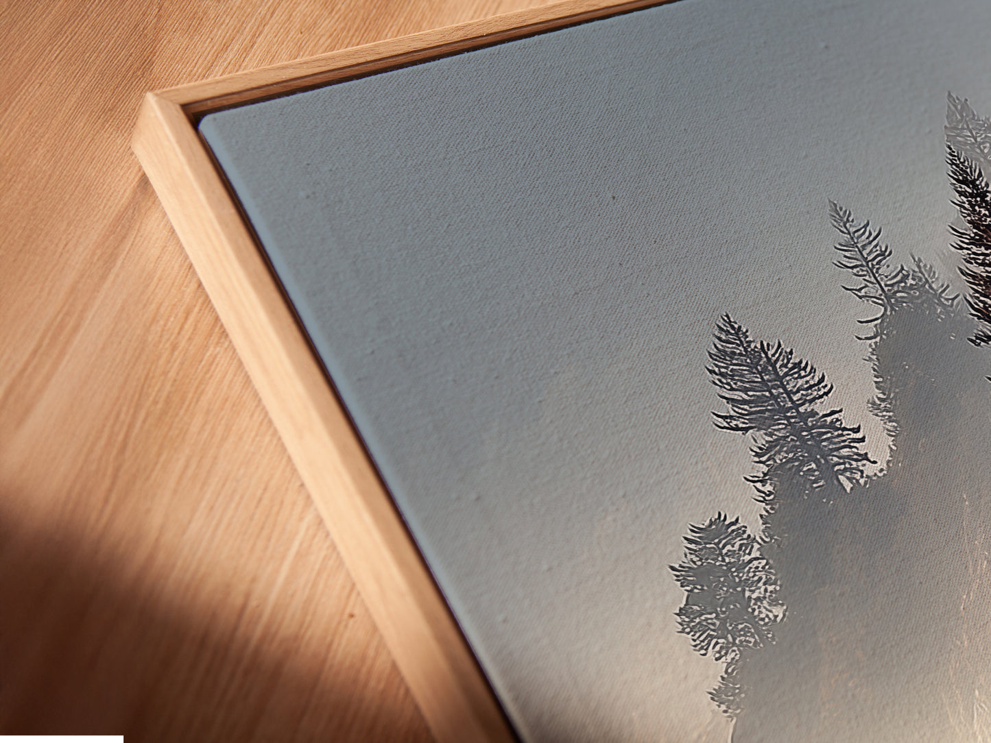 Angled close-up of a Coastal Scenery Canvas Print in a floating frame.  The floating frame enhances the modern look of this seascape print. This fine art piece is perfect for adding a touch of elegance to your living space.  Elevate your home decor with this beautiful artwork