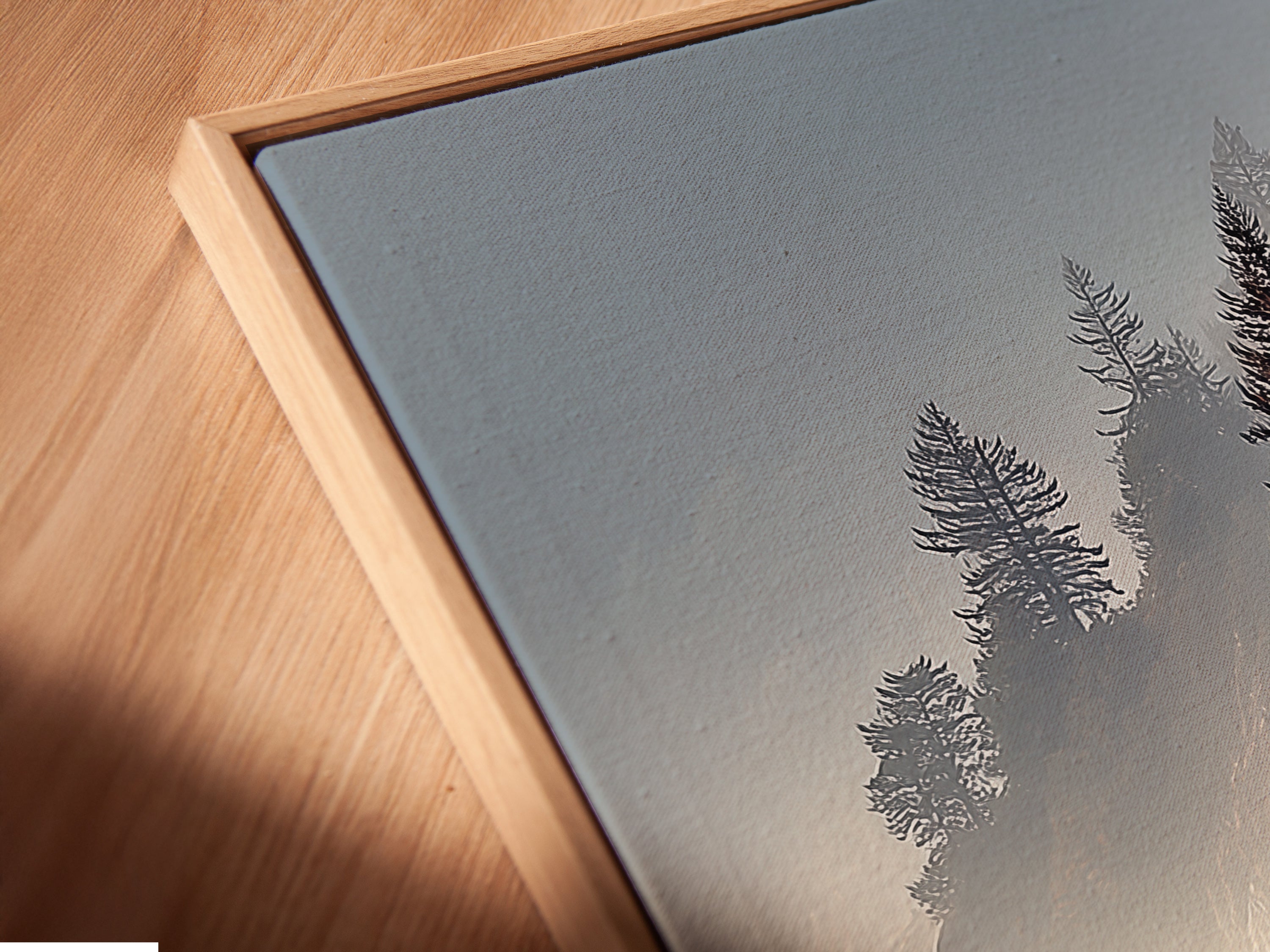 Angled close-up of a Coastal Scenery Canvas Print in a floating frame.  The floating frame enhances the modern look of this seascape print. This fine art piece is perfect for adding a touch of elegance to your living space.  Elevate your home decor with this beautiful artwork