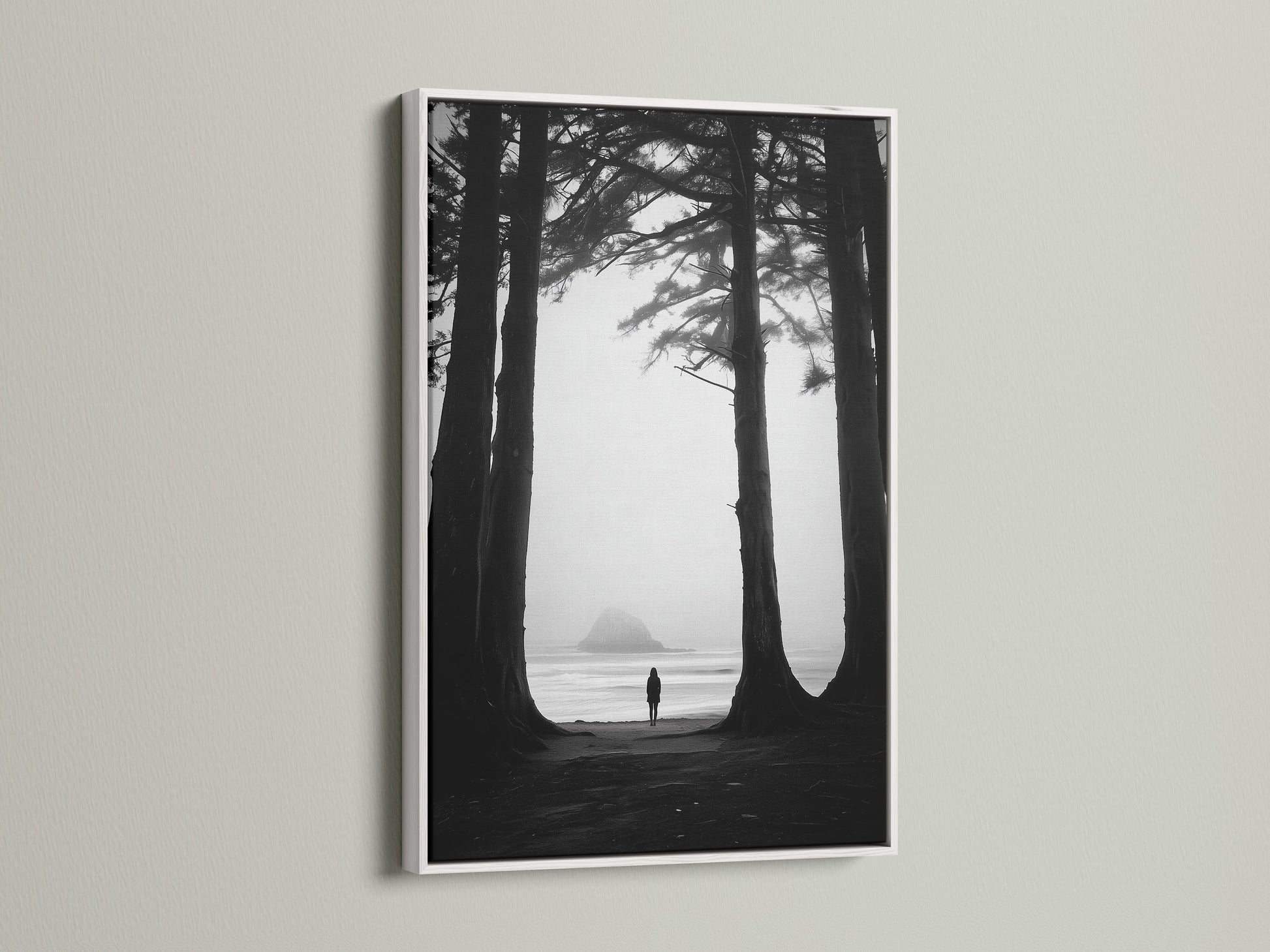 Fine art print of a beach scene with a lone figure. This artwork is elegantly framed in white. The white frame offers a clean modern aesthetic. It complements the black and white art beautifully. View this white frame option.